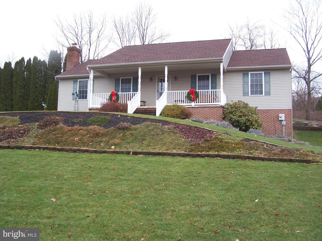 Pride of ownership! This immaculate, ranch home situated on .38 acre features 3BDS, 2BAS, spacious rooms, Mstr. w/2 walk-ins, BA w/6Ft. shower, kitchen w/breakfast nook, formal DR, 12 x 15 screened sun Rm., & 15 x 19 deck. Home has new roof & water heater, & is 2x6 constructed. LL is ready to finish w/extra height block walls & pellet stove. A 2-car over-sized garage w/Fr. sink is integrated into the LL, & the home is generator-ready.