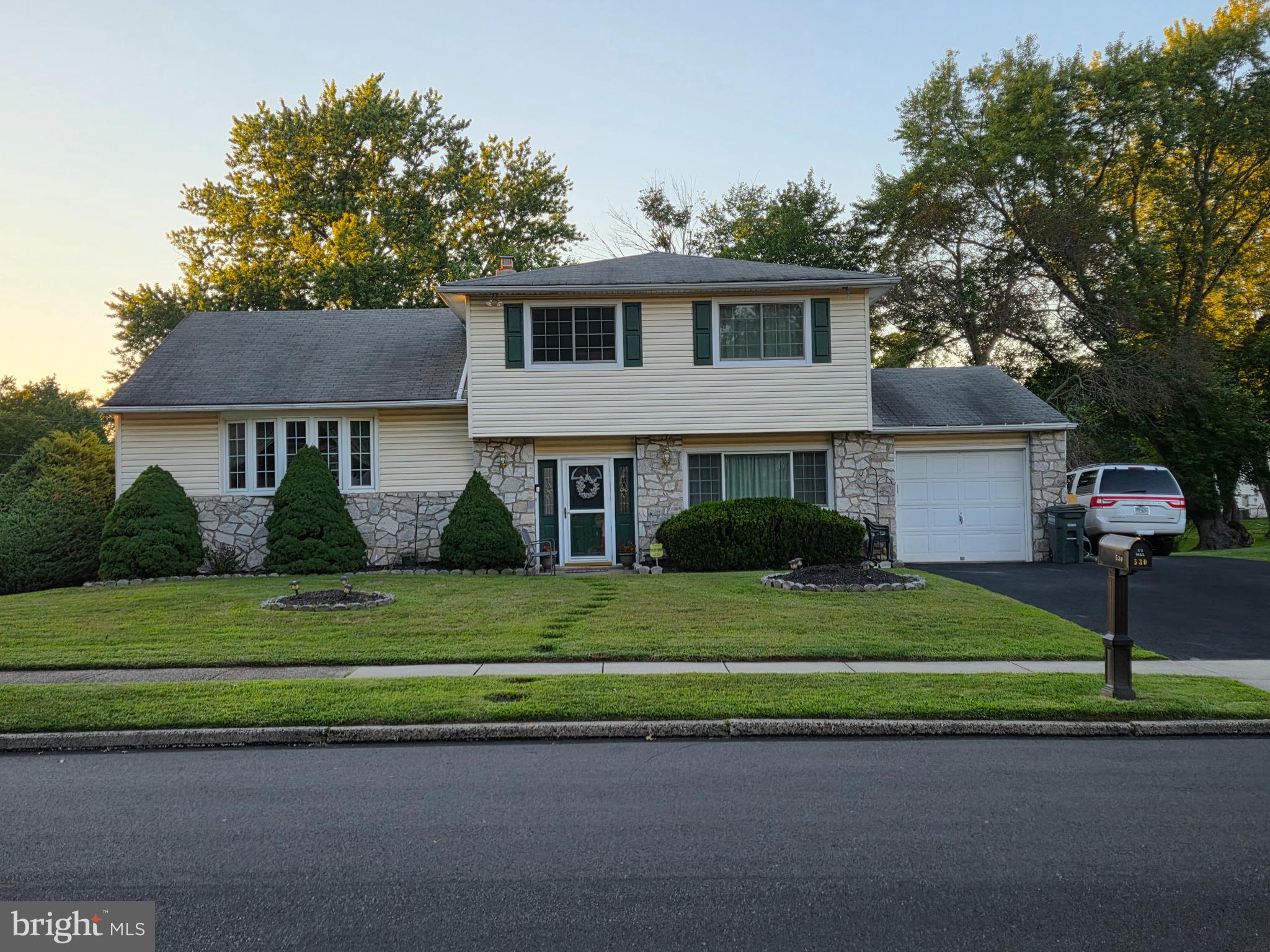 OPEN HOUSE SUNDAY AUGUST 24TH (1-3pm). Large Split Level in desirable Upper Southampton Township. This home has great In-Law Suite possibilities with a first floor bedroom, full bath, family room with a gas fireplace, laundry room, and a large foyer with no steps into the front entrance! Three generous size bedrooms and 2 full baths are on the upper level as well. The main floor has an updated kitchen with wood cabinetry, gas cooking, and sliding doors that lead to a deck in the beautiful backyard, a full dining room and a living room with a gas fireplace and a beautiful bay window. There's a 1 car attached garage and plenty of driveway parking. Also included is a partial basement, 200 amp electrical service, newer hvac, newer hot water heater, newer high quality insulated vinyl windows throughout, and newer entry doors. Check it out before it's gone!