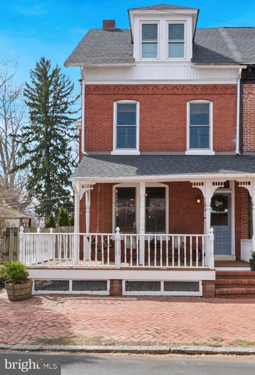 Welcome to 304 S Darlington Street, a beautifully maintained and lovingly renovated historic home in the vibrant heart of West Chester, PA. This exquisite 5-bedroom, 2-bathroom property artfully blends timeless charm with modern upgrades, making it an ideal sanctuary for contemporary living.

Step inside to discover the refinished original hardwood floors that grace the spacious living room, enhanced by large new windows that allow natural light to pour in through plantation style shutters. The gourmet kitchen was remodeled in 2021 and features new appliances, ample counter space, and a thoughtfully designed, open layout. Adjacent to the kitchen, the renovated dining area boasts a built-in storage bench, perfect for family gatherings. A beautifully designed and functional addition was added in 2019 with a second full bathroom, mudroom/laundry room, and large pantry. 

For relaxation, take your coffee outside to the newly added deck out back or unwind on the classic front porch as neighbors stroll by. 

On the second and third floors, you’ll find five inviting bedrooms and an additional full bath. The main bedroom provides a calming retreat, with natural light and generous closet space. The third floor was transformed in 2023, with closet renovations and custom built-ins in the fourth and fifth bedroom/office. Other recent upgrades include ceiling insulation added in 2020, ensuring comfort and energy efficiency throughout the home.

Key improvements throughout the home include a new roof installed in 2023, all windows replaced in 2017, high-efficiency water heater installation and an HVAC replacement (furnace, AC, and condensing unit) in 2022, along with regular maintenance to keep everything running smoothly. 

This home is ideally located just a few blocks from downtown West Chester, with access to fantastic restaurants, shops, cultural attractions, and Everhart Park. Commuting is effortless with convenient access to major highways and public transportation.

With its rich history, prime location, and extensive list of modern updates—including exterior landscaping completed in 2020 and recent painting in 2023—304 S Darlington Street is a remarkable find. Don’t miss the chance to make this stunning property your new home!
