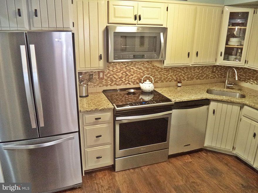 OPEN SAT & SUN 1-3pm*PERFECT home for Down-sizing/Right-Sizing into for 1st-Time Home-Owners OR Mature Couples !...DC COMMUTER'S DREAM*MOVE-IN READY BEAUTY ! Hand-Scraped Hickory Wood-Like floors* HARDWOOD(Parquet-floors) under upstairs bedroom carpets *Kitchen GORGEOUS Granite/Stainless/Custom Ceramic Back-Splash/CONVECTION/WINE-FRIDGE KITCHEN* Double French-Drs to Sep DINING*3BR/2.5 UPDATED-BATHS* Fresh SLIDERS to Fenced-PATIO to Trees/Privacy*Cul-De-Sac Location*Covered-Entry Welcomes ALL* 2 Parking Spaces*STORAGE-Area plus Pull-Down Attic-Stairs STORAGE*HOME WARRANTY Inc.*CONDO fee covers everything you need, including water, lawn care, trash, leaf and snow removal and exterior maintenance (which includes exterior paint and roof replacement). Minutes to 270 for commuting (exit 6), bus access to Rockville metro (redline)* SHORT Amble to PARK/SWIM-Club/BUS/PLAYGRND/SHOPS*mmm...You're Gonna LOVE IT !