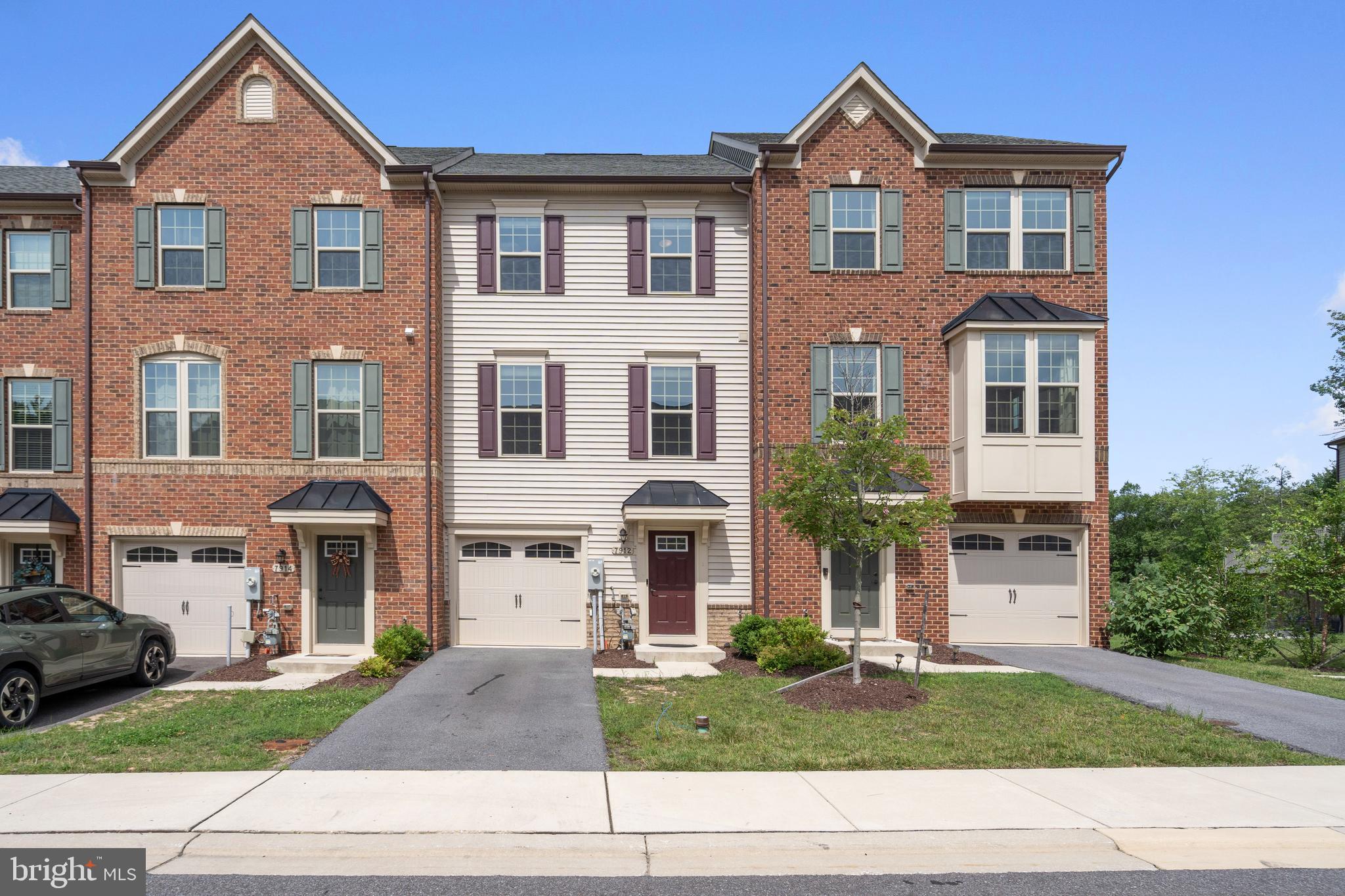 Welcome to 2,350 sqft, 3-level townhome located in the sought-after community of Parkside. This home has a 1 car garage, 9 Ft ceilings on the main level, Fresh paint entire home,hardwood floors throughout the main level,Hardwood on both stairs and Brand new LVP floors on Lower level and Bedroom level. This townhome delivers a sophisticated luxury and a low-maintenance lifestyle. As you enter this home, you are greeted on the lower level, where 1 car garage leads to a huge bedroom with full bath. The upstairs features a spacious living room gleaming with authentic hardwood flooring and sun-loving with its multiple double pane windows. The gourmet kitchen with 42'' white cabinets and recessed lights have high-efficiency appliances ideal for the at-home cook or experienced chef. The cook will enjoy gas stove, oven, built-in microwave and not to compromise, a 8 ft infinity kitchen island; large enough to seat 4! There is also a dinette, great for extra seating or formal dining. Just beyond the kitchen is a comfortable living room surround by natural light. The living room leads to a set of French doors leading to the Trex deck perfect for an outdoor living space. The upper level features a spacious primary suite with a tray ceiling, generous size two walk-in closets, and a bank of windows. The ensuite offers a double vanity bowl, plenty of cabinet drawers and a separate shower, a large bathtub, and a private bathroom. This home also includes two large additional bedrooms, each with closets, a shared bathroom, a side-by-side washer/dryer closet, and even more storage.This community has an expansive network of walking trails, a large community pool, clubhouse, fitness center, nature park, and event lawn space. This home has all you will need to be comfortable working from home, school, and play! Accessible to major routes I-295, Rt.175, Rt. 32, conveniently located next to Ft. Meade, and NSA. Just minutes from Arundel Mills shopping center, recreation, dining, and shopping. Do not miss this opportunity-Call and schedule your tour today!