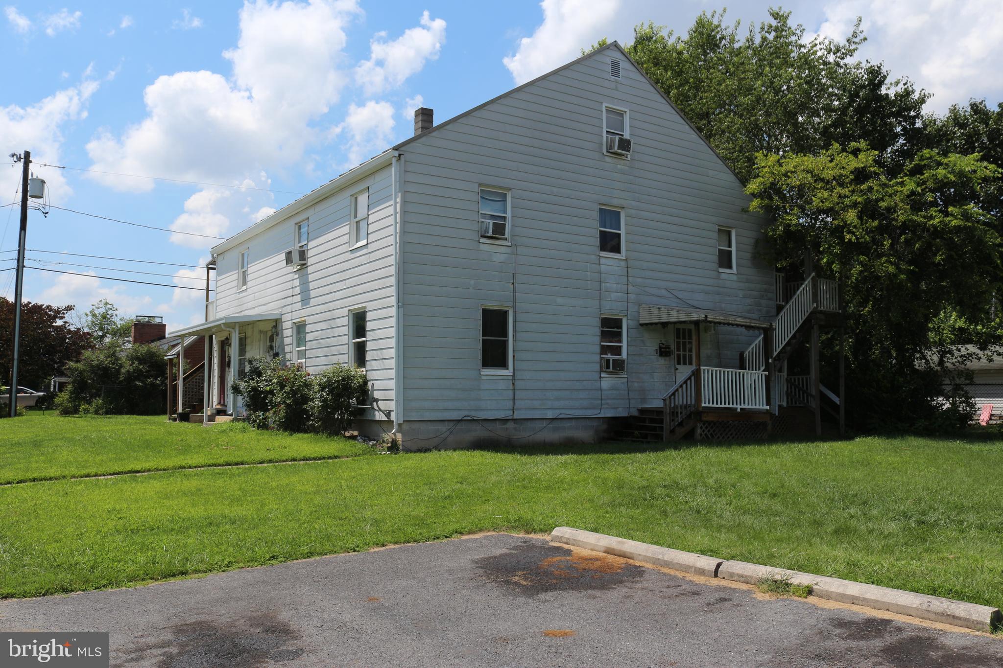 Excellent 5-Unit Investment Opportunity – Prime Location in Hagerstown
Located at 17410 Wilford Avenue, this well-maintained 5-unit multifamily property presents a solid investment opportunity with stable income and long-term upside potential. The building consists of a mix of units: three 1-bedroom apartments, one 2-bedroom unit, and one spacious 3-bedroom unit, generating a gross annual income of $53,100. There is coin operated laundry for additional income.
Originally updated in 2013, the property features newer windows, roof, and white aluminum siding, offering long-lasting durability and curb appeal. Sitting on an oversized lot, the property also offers potential for future development or expansion, such as a small additional structure (subject to zoning approval).
Amenities include off-street parking for tenants and a convenient location near Halfway Park, shopping centers, and major interstates (I-70 & I-81), ensuring high rental demand. The property is in overall good condition, and while current rents may be slightly below market, there is room for value-add through rent adjustments.
Whether you're a seasoned investor or expanding your portfolio, this property offers strong fundamentals, cash flow, and future growth possibilities.
Don’t miss this opportunity to own a turnkey income-producing property in a growing area!