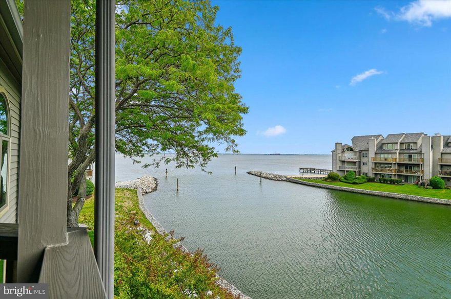 Experience luxury waterfront living in this stunning top-floor loft condo located in the premier gated community of Chesapeake Harbour. Boasting one of the most coveted views in the neighborhood, this 1,478-square-foot residence features two spacious bedrooms, two full bathrooms, soaring ceilings and an open-concept layout that flows seamlessly to a private balcony overlooking the marina and the Chesapeake Bay. The interior is highlighted by modern wood flooring and a versatile upper-level loft, perfect for a home office or extra guest space. Residents enjoy a resort lifestyle with access to two swimming pools, a private sandy beach, tennis courts, and on-site dining, all within a secure 24-hour guarded community just minutes from downtown Annapolis.