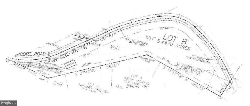 Convenient location with a secluded building site. Clear out just enough of the trees to enjoy the view from the top of this 5.44 wooded parcel on Airport Road. State approved entry location permit in place with WVDOH. Public water is in front of property on Airport Road. Choices on public sewer are tying into adjacent subdivision by attaining right-of-way easement from them,  there's also a forced sewer main that runs behind property adjacent to Buzzard Run or install a private septic system.