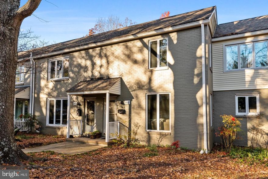 Welcome to Dreams Landing, a picturesque and secluded waterfront community on the banks of the Severn River just minutes from downtown Annapolis. Unit #1002 is one of the few homes in the community having 4 finished levels of living space including the finished walkout lower level with 1/2 bath & built in cabinets. Also included in the sale is a highly coveted boat license for a slip in the community marina. The main level living room is bathed in natural light and adorned with wood flooring, creating an inviting ambiance. The open-concept kitchen provides ample space for dining  and seamlessly connects to the deck & fenced courtyard with its handy garden/tool shed. Ascending to the the second floor, you'll find an updated bathroom featuring 2 sinks and a spacious shower plus 2 generously sized bedrooms, each with wood flooring. Stairs from the primary bedroom access the finished, well lit 3rd level with its ample storage areas and open space for a studio, office or den. The main level and lower level have built-in surround sound systems and the entire home includes central vacuum. Additionally, the community offers an array of amenities such as a waterside pool, pool house equipped with shower and party room, marina with kayak and dingy storage, gym, bike storage area, wood working shop plus 4 parking lots providing ample spaces for all residents. Street parking is also available. All this and just minutes from Historic Annapolis and commuter routes leading to the Eastern Shore, Baltimore, Washington DC and BWI Airport & Train Station. Don't let this chance slip away - seize the opportunity to make this exceptional property your own!