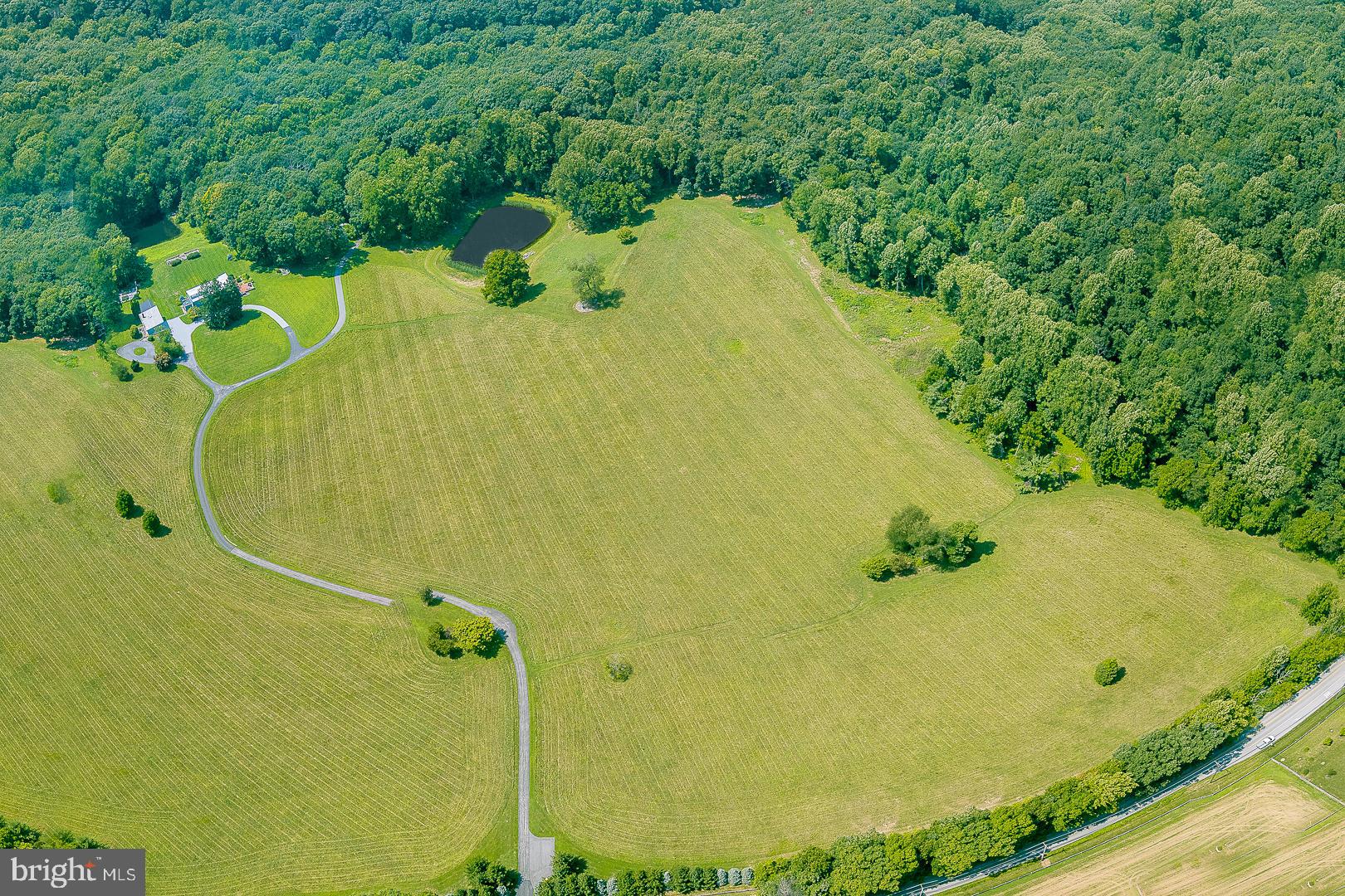 Developers' alert - approximately 130 acres of land. 7 tax parcels forming the land that can be developed.
Currently has one Main 3 bedroom house fully renovated in 2017, fully updated Tenant House, Guest/Office building with full kitchen, living room, 2 bedrooms, full bathroom, 4 offices with separate entrance and bath. 2 car heated garage and additional 3 car garage/storage and mechanical shed. The land has 3 stocked ponds, 2+ miles of trails through fields/woods, 30 acres of open unfenced fields, three ponds, hidden screened porch outlooking into woods, stone walls and 6+ stone terraces with views throughout the property, walled deer proof garden with raised beds, deer fence along one boundary line.