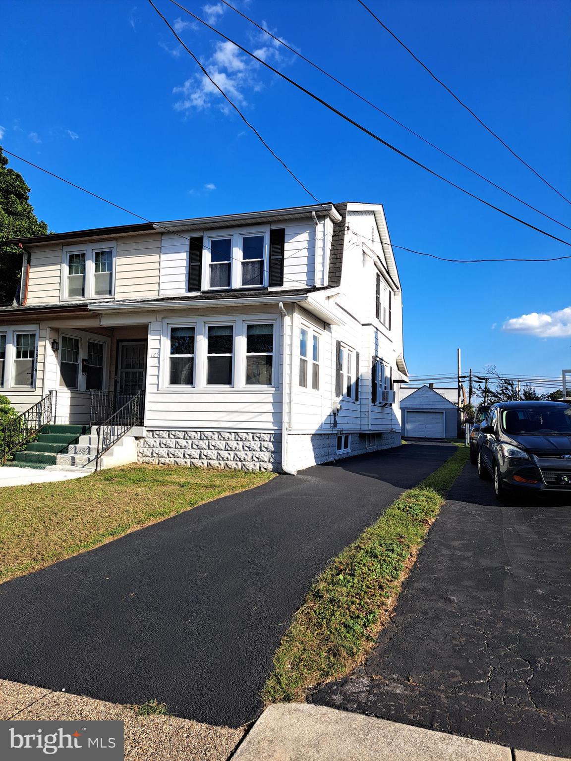 Welcome to 125 N Scott, right in the heart of Glenolden and the Interboro School District! Equipped with 4+ car driveway and detached garage, this beautiful home has been renovated from top to bottom and is ready for it's new owners! From an open floor plan with refinished original hardwood floors, to a perfect naturally lighted sun room, to the breakfast nook bar leading into a brand new vinyl floor kitchen with stainless steel appliances and granite countertop - this home is sure to leave you falling in love. As you make your way upstairs, you'll notice new carpet throughout and a gorgeous bathroom right at the top of the stairs, as well as 3 generously sized bedrooms. Lastly as you make your way into the basement, although unfinished, still very clean with ample storage space and plenty of room to use your imagination for any future projects. The opportunity to own such a precious home won't be around along. so please don't hesitate to book your showing today!
