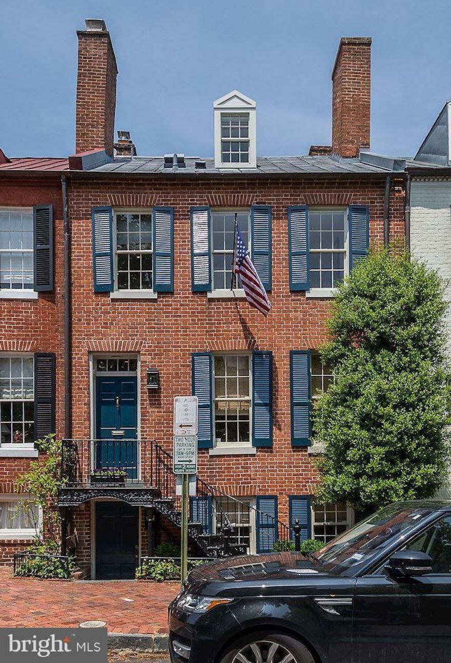 Beautifully updated 4BR/4.5BA with spacious living and dining room that flow nicely onto large rear garden. Receives excellent natural light throughout, stunning wide plank hardwood floors, 5 fireplaces. Lovely rear garden with plentiful space and alley access to 28th Street with storage shed. 1 RENTAL PARKING SPACE NEARBY - OWNER WILL PAY FOR 1 YEAR PARKING LEASE.