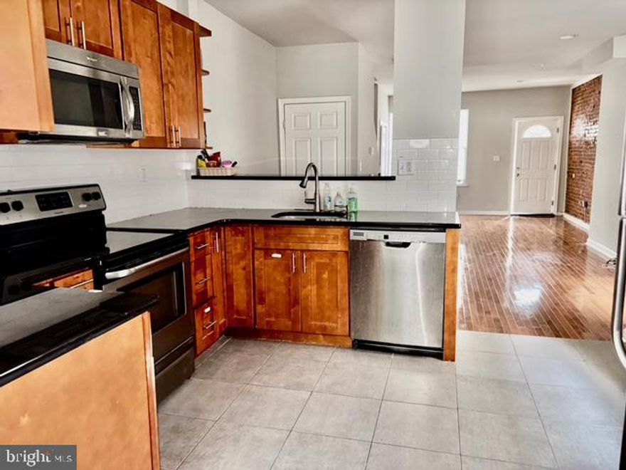 5118 Delancey Street is a renovated Philadelphia classic in the Cedar Park enclave. It features hardwood floors, a front porch, exposed brick and a charming, decorative fireplace mantle. Other amenities include central air conditioning/heat, washer/dryer, dishwasher, built-in-microwave and a garbage disposal. This 1300 square foot home is just minutes from the commercial thoroughfare of Baltimore Avenue, Dock Street Brewing Company, Booker's, Toast Cafe and Malcolm X Park. Nearby SEPTA routes, offer easy access to anywhere. Pets are welcome with a 300 refundable pet deposit. Tenants pay for gas, water and electricity.