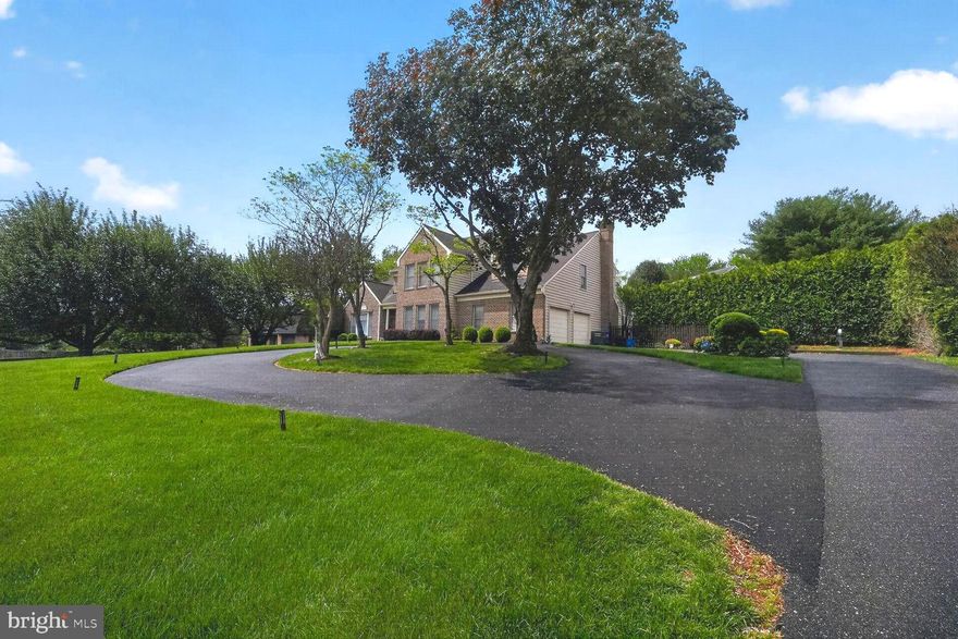 Welcome to this exceptional residence in idyllic Darnestown Hills, where refined design meets effortless, resort-like living. Offering over 5,000 finished square feet across three beautifully finished levels, the current owners have invested nearly $300,000 in upgrades over the last three years, and the quality of those improvements is evident throughout. The heart of the home is the chef’s kitchen, a true showpiece with sleek, two-tone European-style cabinetry and a full suite of commercial-grade Miele appliances. A built-in Miele espresso machine and a wine fridge discreetly integrated beneath a perfectly proportioned waterfall countertop, creating both a functional workspace and a striking visual centerpiece. The kitchen opens seamlessly to a large family room, where a stylish fireplace adds warmth and character while complementing the generous scale of the space. This open layout is ideal for both everyday living and hosting gatherings. Stepping outside, you’ll discover a resort-caliber retreat in the backyard. A heated pool and spa provide the focal point, enhanced by resurfaced finishes, professionally redesigned lighting, and lush landscaping that create a stunning atmosphere both day and night. The new, fully equipped gazebo with bar seating makes outdoor entertaining effortless and inviting.The main level also includes a formal living room, a formal dining room, and the perfect home office behind glass French doors. Upstairs, the luxurious owner’s suite awaits, featuring a new spa-like bathroom with a fireplace overlooking the soaking tub, a spacious walk-in shower, and magazine-worthy finishes. A peaceful sitting area and two walk-in closets provide comfort and convenience. Three additional well-proportioned bedrooms and another beautifully renovated bathroom complete the upper level. The beautiful living space extends to the fully finished lower level, boasting two bonus rooms connected by a renovated full Jack-and-Jill bath. This level is ideal for recreation and relaxation, with a stunning built-in wine wall, a workout area, and the perfect place for movie watching. Practicality pairs with luxury through the home’s abundant parking options, including an extended driveway and a new circular driveway at the front of the property, adding both convenience and impressive curb appeal. This property seamlessly blends high-end design, modern functionality, and resort-style outdoor living, offering an exceptional opportunity for its next owner to move in and enjoy immediately.