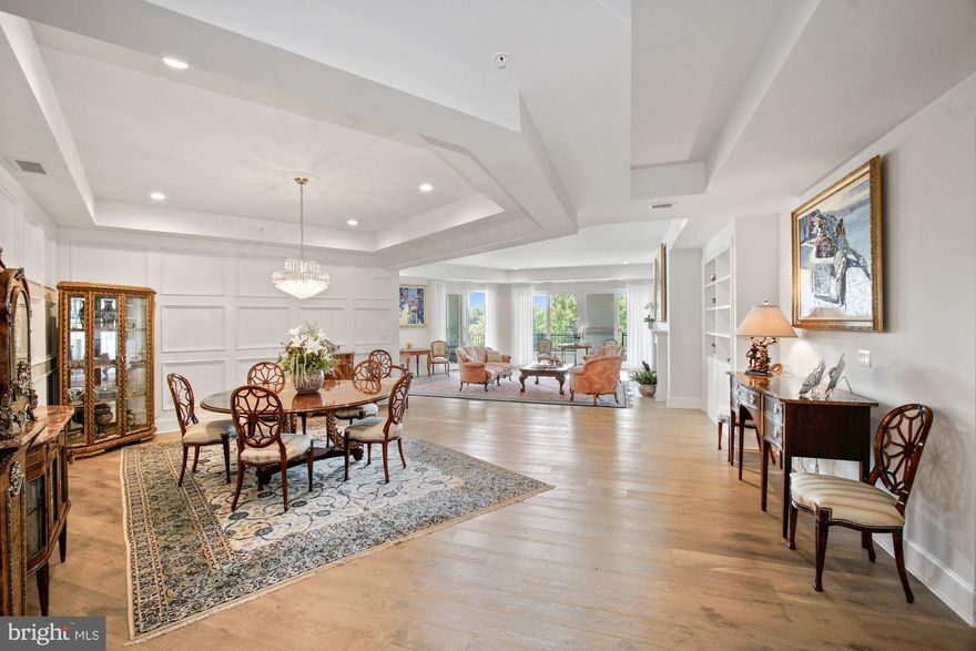 NEW PRICE! Welcome to Quarry Springs where you are greeted by your own private security at the entry gate and your own doorman welcoming you into the lobby.  Additionally a beautifully designed clubhouse and swimming pool provide amenities on a grand scale.  This Penthouse unit, completely custom fitted with wide plank elegant hardwood floors, beautiful custom mouldings and designer lighting throughout offers high ceilings and an abundance of light.   Expensive finishes and fixtures are the hallmark of this elegant 3 bedroom 3.5 condominium complete with library/den.  Lightly lived in, this spectacular residence offers breathtaking views from the entryway through the dining room and living room all the way to the balconies.  Light filled rooms are found  throughout with easy access to the spacious wrap around balcony accessed from almost every room.  A designer kitchen with high end appliances includes an island as well ample space for a breakfast room.  A full size laundry room with ample space for storage is found off the main hallway.  Quarry Springs residences each have private elevator access into the unit.  Additionally there is 2 car assigned parking in the garage,  accessed through the private elevator.   Five to ten minutes to the best of shopping and restaurants in Potomac Village.  Carefree living on a grand scale, and the Penthouse unit as well!  Welcome Home!