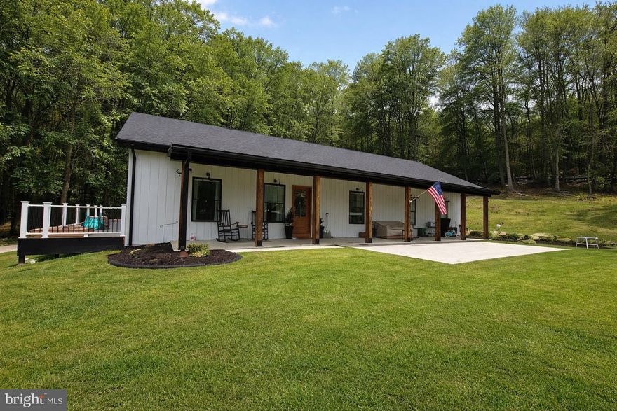 Nestled in the scenic hills of Cumberland, this exceptional 10-acre property offers the perfect balance of privacy, recreation, and everyday comfort. Perched gracefully along a peaceful hillside, this home provides breathtaking views, fresh mountain air, and the kind of tranquility that’s increasingly hard to find.  From the moment you arrive, you’ll notice the sense of space and freedom.  Ten sprawling acres surround the home, complete with thoughtfully maintained walking paths that wind throughout the property. Whether you enjoy morning strolls, evening sunsets, hiking, or simply exploring your own land, this property invites you to step outside and stay awhile.  This property isn’t just a home — it’s a lifestyle. It offers privacy without isolation, recreation without leaving your land, and space to breathe without sacrificing convenience.  Call to schedule a private showing and make this home yours!