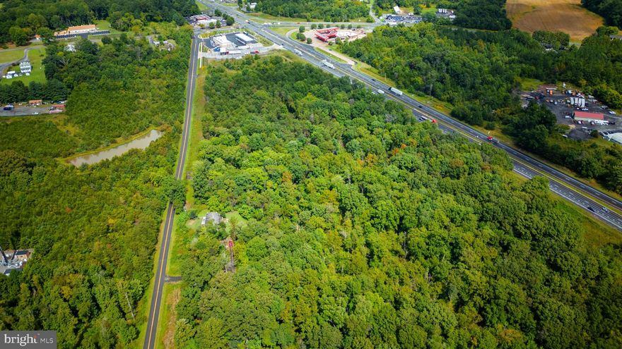 Prime Business Location.  Visibility on Route 15/29 at the Route 17 Interchange in Opal.  10.2 Acres, half is agricultural and half if commercial highway.  Future Land Use called for is Mixed Commercial/Light Industrial.     Buyer will need to register site plan and follow County Permit and possibly Rezoning process depending upon plans.   Sellers do not possess a survey.  More than 25,000 ATD.

Sewer is planned in the Opal Service District Master Plan but not scheduled yet.
Well Test will need to be performed by Buyer as part of due diligence
Signage potentially visible on Rt 15/29, Ingress/Egress potentially on Avatar Way
C-2 Zoning supports a variety of retail uses, including auto sales, farm equipment sales.

Buyer or Buyers Agent should verify all utilities with service providers.