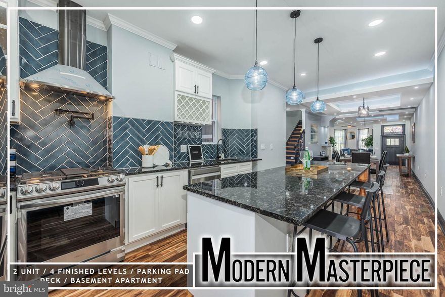 Welcome to this Modern Masterpiece in the sought-after Reservoir Hill neighborhood, where contemporary elegance meets unparalleled comfort. This remarkable residence boasts over 3,300 square feet of beautifully designed living space across three finished levels. The main unit invites you in with a spacious living room featuring a cozy gas fireplace, creating a perfect ambiance for both relaxation and entertaining. The chef's kitchen is a true highlight, showcasing high-end stainless steel appliances, sleek granite countertops, and a generous island that’s ideal for casual dining or gathering with friends. On the second level, you'll find three well-appointed bedrooms and two full baths, providing ample space for family and guests. The third level is dedicated to a luxurious Primary Bedroom suite, complete with its own electric fireplace, a walk-through closet, and a spa-like bath featuring a separate shower and a whirlpool tub—your personal retreat within your home. The lower level offers a versatile basement apartment with a private entrance, living room, kitchen, and 1.5 baths, perfect for extended family, guests, or rental income. Enjoy the convenience of maintenance-free decking and a dedicated parking pad, ensuring that every aspect of this home is as practical as it is stylish.  Unique & thoughtful features include a wine cooler, a pot filler, hideaway kitchen outlets, Gypsum ceiling art, mood lighting, laundry chute, and more! Located in the vibrant Reservoir Hill area, this home combines modern amenities with classic charm, making it a true standout.