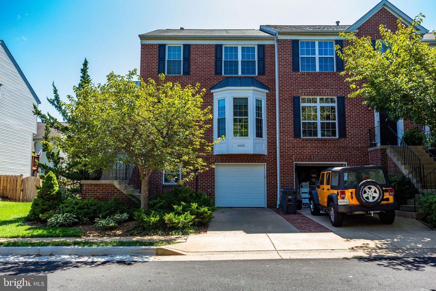 Gorgeously updated 3-level end-unit 4BR/2.55BA townhouse in desirable Great Falls Chase! New flooring throughout! New windows! Roof and HVAC less than 5 years old! Eat-in kitchen w/ island, gas cooking and access to rear deck w/ spiral staircase to lower level patio! Master suite w/ vaulted ceiling, walk in closet, double vanities & large shower! Walk-out lower level rec room / 4th BR w/ half BA! Ample parking for guests and only 1 block walk to bus with a 10 min ride to Metro! 1 block to shopping, restaurants, cleaners, bank & more! Call today for your private showing!