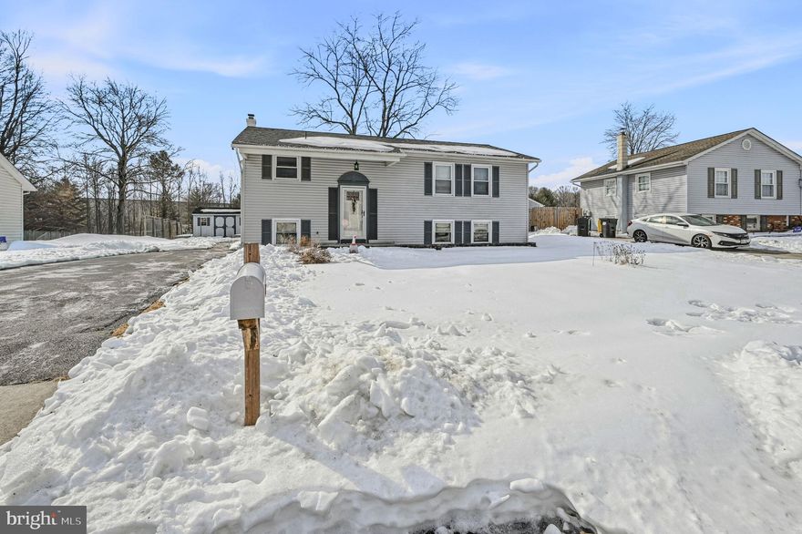 Welcome to this spacious 4-bedroom, 2-bathroom bi-level home located in the community of Scottfield in Newark. The home features beautiful original hardwood flooring throughout the main level,  kitchen equipped with granite countertops and stainless steel appliances, dining area with sliders leading to a generously sized 2-level deck with two built-in benches (Grill and garden boxes included), overlooking a private backyard that backs to open space providing a peaceful retreat. There are 3 bedrooms on the main level all with a ceiling fan and nice size closets.  
Lower level has LVP flooring, a spacious bonus area, a large bedroom, full bathroom, and an additional room that could serve as a potential office.  Laundry area (washer & dryer not included) and an ample amount of storage space, providing convenience and functionality for everyday living.  Additional amenities include central A/C and a heat pump with electric backup for year-round comfort. There is an extended driveway for ample parking and a detached garage. 
Conveniently located near shopping, the University of Delaware, major roadways and Newark Charter.  This home offers comfort and convenience for its new owners. Don't miss out on this opportunity to make this house your new home sweet home.