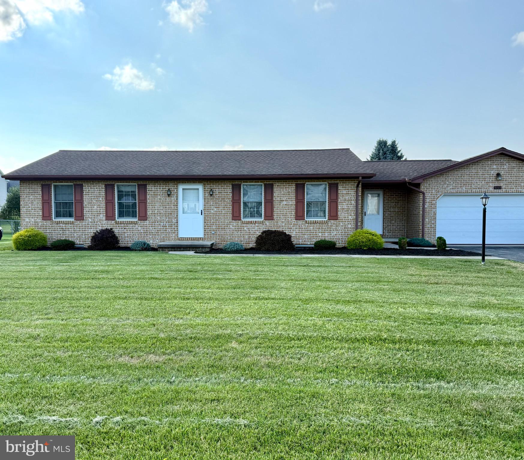ONE OWNER, ONE LEVEL, EASY LIVING! Who doesn't love a brick rancher? This house has been impeccably maintained, and is situated on just under a half an acre. With 2 bedrooms, 1 full bath; it's such a cozy home. A nice dining space, a nice open kitchen and a great living space will make you fall in love. An enclosed breezeway is conveniently located, has your washer and dryer along with good storage and closet space. The basement is the full size of the house and is a blank slate. A large level lot, great location, clean and move in ready,