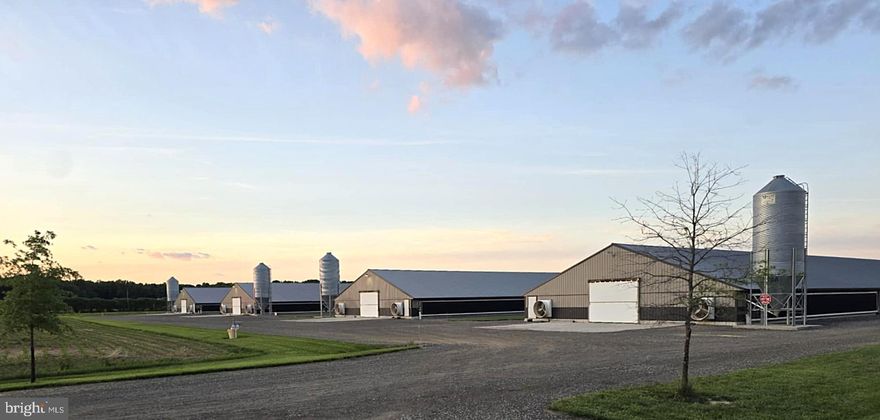 Poultry farm features a total of 60.57 acres (40 acres tillable, 8.5 acres wooded, 1.5 acre retention pond) and a 40x72 shop that has garage parking and a separate space that could be finished for permanent living. Located approx. 5 miles from the DE line. Expired site evaluation-no septic on property.