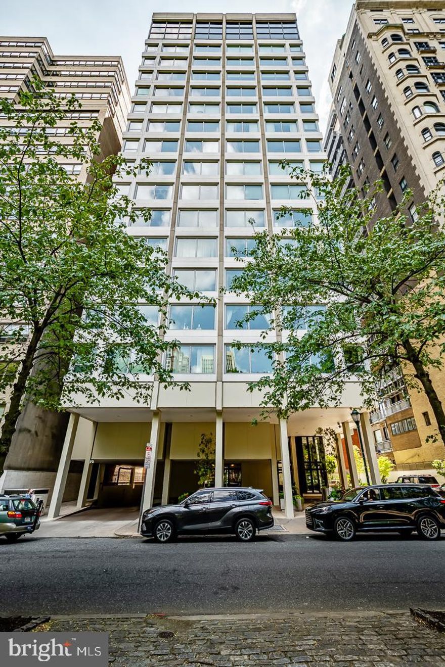 Make this luxurious, rarely offered high-floor residence at the iconic 1820 Rittenhouse Square your next home, and you will never want to move again. There is no reason to. You have made it!  One of only 29 units, this boutique building is the ONLY building on the residential South side of the park WITH GARAGE PARKING. Boasting 3217 square feet of thoughtfully appointed space, this half-floor apartment has everything today's discriminating buyer is looking for. Showcasing three bedrooms, three full baths, and a powder room, this floor plan is one of the best in the city. Come off the elevator and enter your home from 
a generous double foyer that offers the owner the ability to showcase an unparalleled amount of artwork within its gallery setting. This sets the tone for the rest of the home, opening up to a spectacular duel living space boasting a discreetly hidden wet bar with refrigerator and ice maker, showcasing new floor-to-ceiling windows that span almost 50 feet of unparalleled and unobstructed Rittenhouse Square views and a corner view. There is nothing that compares to it. The cornered windowed dining room is gigantic and able to host any size family for a holiday or an event. Perfect for gracious entertaining. The vast and modern custom chef's kitchen, featuring a Sub-Zero fridge, stainless steel appliances, generous counter space, an ice maker, a beverage center, and a built-in breakfast table by the window, offers the perfect setting to cook and congregate, a rare find in apartment living.  The gallery hallway leads you to a service entrance, a walk-in cedar closet, and a full-sized laundry room. Then two generous bedrooms share a Jack and Jill bath.  The light-filled Primary is nothing short of spectacular. Full unobstructed Southern views command the space. Boasting two walk-in closets with dressing areas and two full bathrooms. The ultimate in luxury! Do not miss out on this one-of-a-kind residence on a sought-after high floor. They are rarely available.