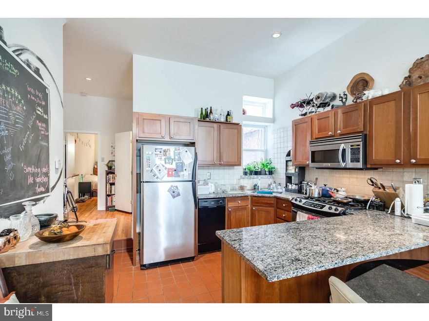 This cozy Queen Village apartment features a spacious living room with an open kitchen, making it the perfect place to entertain guests! With hardwood floors throughout, and a renovated kitchen featuring the latest fixtures and finishes this property won't last long! The large bedroom features a spacious closet to hold all of your necessities, and more. Enjoy a sunny day outside on the private patio, creating the perfect escape from the busy city! This property also features high ceilings and central air, and comes complete with a washer/dryer & dishwasher. The spacious basement of this property ensures that you can store all of your personal belongings! Just minutes from Center City, Rittenhouse Square, and Jefferson - this place is the perfect location!