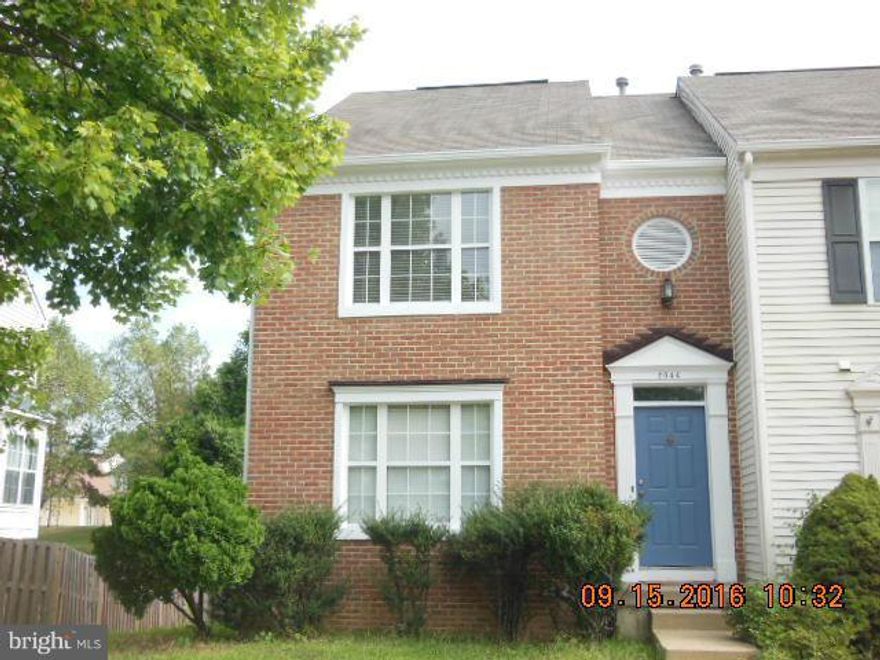 Freshly painted and ready for you - this End Unit townhome offers an excellent value with easy access to major commuter options.  This 3 finished level brick front townhome is located in the desirable community of Rolling Brook.