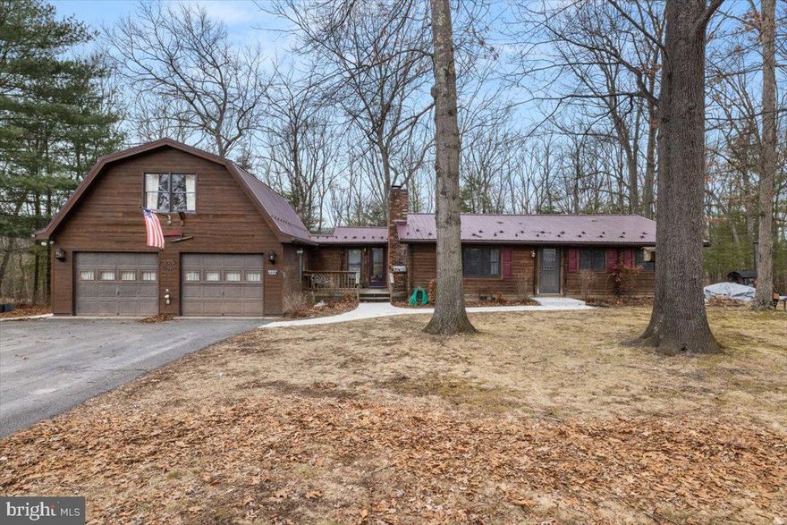 ***Back on the market.  Please call the listing agent with any questions***

Tranquil Mountain Retreat in Berkeley Springs – No HOA!
Welcome to 422 Clearfield Dr, a charming mountain escape in the heart of Berkeley Springs, WV. This peaceful retreat offers the perfect balance of privacy and convenience, making it an ideal full-time residence, weekend getaway, or investment property.  Step inside to find a warm and inviting interior featuring hardwood floors, wood burning stove, and updated appliances.  Seller offering a 1 year home warranty.

Bonus Opportunity! The seller has already purchased materials to upgrade both bathrooms, and they will convey with an acceptable offer—giving you the chance to add your personal touch and increase the home’s value right away!

Durable & Energy-Efficient Features
This home has been upgraded with a metal roof and gutter guards, offering long-term protection and minimal maintenance. The central boiler heat system ensures efficient and cost-effective heating, keeping you warm through the seasons.

Need more space? An additional room over the garage is ready to be finished, offering the potential for an extra bedroom, home office, studio, or recreational space—customize it to fit your needs!

Expansive Storage & Outdoor Features
For those who need extra space and storage, this property also includes:
 A massive 24x48 detached building – ideal for a workshop, garage, or additional storage.
Two 10x16 sheds – providing ample space for tools, equipment, or outdoor gear.
 A chicken coop – perfect for farm-fresh eggs and a touch of country living.

Enjoy serene woodland views from your front porch, expansive deck, gazebo or private backyard, where you can relax, entertain, or stargaze on quiet mountain nights. With a generous lot and no HOA restrictions, this property offers endless possibilities for outdoor activities and hobbies.

Located just minutes from historic downtown Berkeley Springs, you'll have easy access to quaint shops, renowned spas, restaurants, and the famous warm mineral springs. Plus, this home is a nature lover's paradise with nearby hiking, fishing, and outdoor recreation.

Best of all—NO HOA! Whether you're looking for a relaxing retreat, a homestead setup, or a lucrative short-term rental opportunity, 422 Clearfield Dr is a rare find in a sought-after location.

Don’t miss out—schedule your private showing today!