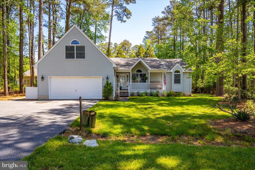 Welcome to Sherwood Forest- Ocean Pines, MD! Nestled Within the highly desirable community of Ocean Pines,just minutes from Ocean City's beaches,boardwalk, and bay, this beautifully maintaned home offers the perfect blend of quality craftsmanship and coastal comfort. Built in 1994, this 3 - bedroom, 2 bath, home features over 2,100 S/F of thoughtfully designed living space including a walk up finished bonus room over the garage that could easily be converted to a 4th bedroom if needed. Open floor plan includes spaciuos kitchen with new appliances. other updates include, luxury vinyl throughout main level,  tankless water heater, carpet, paint, amazing sunroom. Enjoy tranquille views from your screened in porch and outdoor deck to grill, eat, and entertain. Oversized 2 car garage - side entry door to boardwalk.