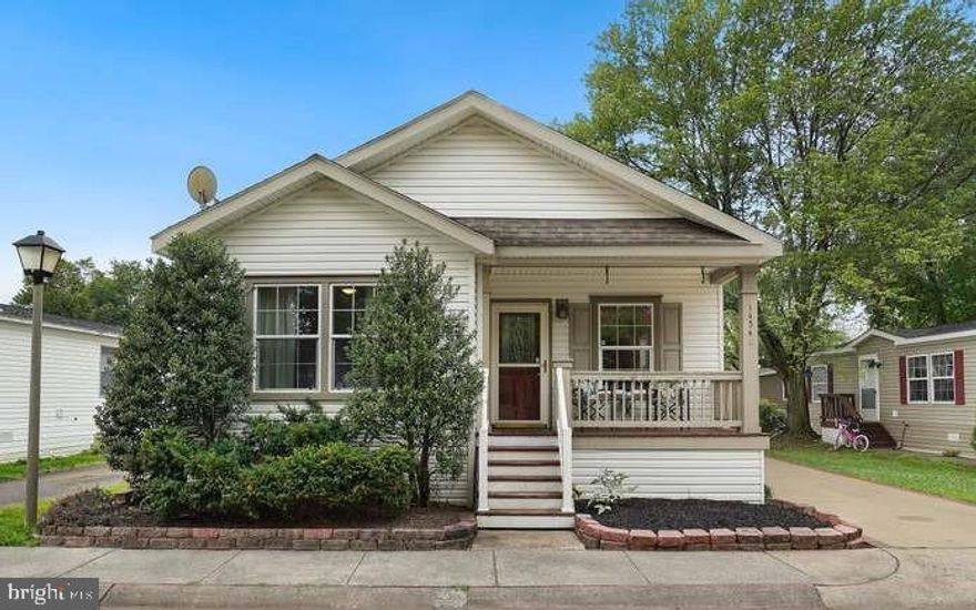 Welcome to your Dream Home!. This beautiful maintained manufactured home is move-in-ready, boasting a clean and inviting admostphere, featuring modern upgrades and an abundance of natural light throughout. With Three spacious bedrooms and ample closet space, this residence is perfect for those seeking extra room. One of the standout features is the large private suite. Imagine having your own sanctuary complete with walk-in closet and a lovely insulated bathroom.  The dual sink vanity with granite countertops is perfect for getting ready in the morning, the second bathroom is equally impressive, featuring similar granite countertops and a chic ceramic tile flooring.  No one will feel cramped here!. The kitchen is a real showstopper! With upgraded granite countertops, sleek stainless steel appliances, and a beautiful tile backsplash, it's perfect for cooking up your favorite meals. Plus there's plenty of cabinet space to store everything you need.  There's so much to list....This home truly has it all, and I can't wait for you to see it in persons! Schedule a showing today, and let me make this dream home YOURS!.  Home is sold AS-IS. Cash or special financing only. Buyer will need to fill out an application first with the property management company and be approved for the lease land.