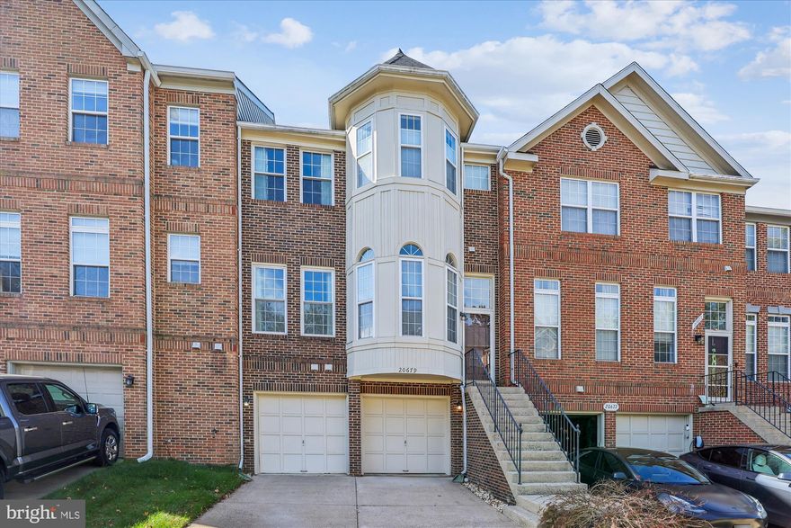 WELCOME HOME! TUCKED AWAY IN THE HIGHLY DESIRABLE LOWES ISLAND COMMUNITY, THIS BEAUTIFULLY MAINTAINED TOWNHOME OFFERS A PERFECT BLEND OF COMFORT, STYLE, AND FUNCTIONAL LIVING.  STEP INSIDE TO A CHARMING BLACK-AND-WHITE TILE FOYER THAT SETS THE TONE FOR THE HOME’S WARM AND INVITING FEEL. ASCEND TO THE MAIN LEVEL WHERE AN OPEN, LIGHT-FILLED FLOORPLAN AWAITS. THE FORMAL LIVING ROOM FEATURES HIGH CEILINGS, CROWN MOLDING, AND HARDWOOD FLOORS THAT FLOW SEAMLESSLY INTO THE FORMAL DINING ROOM—ACCENTED WITH CHAIR RAILING AND ELEGANT MOLDING—IDEAL FOR ENTERTAINING FRIENDS AND FAMILY.  THE RENOVATED EAT-IN KITCHEN IS A SHOWSTOPPER, FEATURING LVP FLOORING, CRISP WHITE CABINETRY, GRANITE COUNTERTOPS, CUSTOM TILE BACKSPLASH, AND A CENTER ISLAND WITH  BREAKFAST BAR FOR CASUAL DINING. THERE’S ALSO A PANTRY FOR ADDED STORAGE. JUST OFF THE KITCHEN, STEP OUT ONTO THE SPACIOUS COMPOSITE DECK THAT OVERLOOKS A BACKDROP OF MATURE TREES—A SERENE SPOT FOR MORNING COFFEE OR EVENING MEALS UNDER THE SKY.  UPSTAIRS, THE PRIMARY SUITE WELCOMES YOU THROUGH DOUBLE DOORS INTO A BRIGHT, AIRY RETREAT COMPLETE WITH HARDWOOD FLOORS, VAULTED CEILING, AND AN EXPANSIVE WALK-IN CLOSET. THE ATTACHED PRIMARY BATHROOM FEATURES TILE FLOORS, A DUAL-SINK VANITY WITH CORIAN COUNTERTOPS, A CORNER JETTED SOAKING TUB, STAND-ALONE SHOWER, AND A BIDET. TWO ADDITIONAL BEDROOMS WITH NEUTRAL CARPETING SHARE A HALL BATHROOM WITH TILE FLOORS, TUB/SHOWER COMBO, AND VANITY.  THE LOWER LEVEL OFFERS A GENEROUSLY SIZED REC ROOM WITH LVP FLOORING, A GAS FIREPLACE WITH MANTLE AND DECORATIVE MOLDING, AND A BUILT-IN BOOKCASE—THE PERFECT SPOT FOR RELAXING OR HOSTING MOVIE NIGHTS. A FULL BATH WITH TILE FLOORS AND STAND-ALONE SHOWER PROVIDES EXTRA CONVENIENCE, WHILE THE LAUNDRY ROOM FEATURES A SIDE-BY-SIDE LG WASHER AND DRYER. FROM THIS LEVEL, YOU CAN ALSO ACCESS THE TWO-CAR GARAGE AS WELL AS A FULLY FENCED AREA WITH A CUSTOM PAVER PATIO, IDEAL FOR ENJOYING A PEACEFUL AFTERNOON OUTDOORS.  FILLED WITH NATURAL LIGHT AND THOUGHTFULLY MAINTAINED, THIS HOME OFFERS THE PERFECT COMBINATION OF ELEGANCE AND EASY LIVING—A TRUE GEM IN THE HEART OF CASCADES. SOME UPDATES/IMPROVEMENTS INCLUDE: DECK STAIRS REBUILT (2025) LEAF FILTER GUTTER GUARD SYSTEM (2023) DISHWASHER (2022) ROOF (2018) WINDOWS REPLACED 10-15YRS AGO WITH EXCEPTION OF BASEMENT WINDOWS AND THE TURRET WINDOWS.
