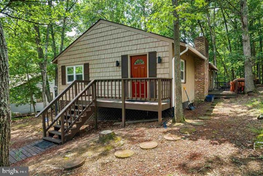 Renovated mountain chalet in Massanutten's 4 Season resort. This Turnkey Furnished Airbnb features renovated custom detailing, warm and inviting floorplan, large bedrooms and a spacious deck complete with Hot Tub where many memories can be made! Superb weekend getaway, primary residence or lucrative investment property as a Turnkey Short Term Rental. This property has a great usable flat yard and also benefits from being close to the amenities of Massanutten as well as the entrance, the ideal place to enjoy the community and surrounding attractions like the Shenandoah National Park and River!