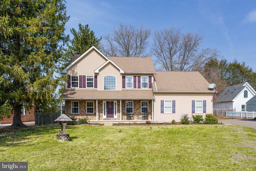 There's no place like home! This beautiful 5-bedroom, 3-bathroom home combines comfort and style. Enter through a 2-story foyer with hardwood floors into a spacious kitchen with stainless steel appliances and a large island—perfect for gatherings. The kitchen serves as the hub of the home, opening to a separate dining room, a cozy family room with wood-burning fireplace, and the back deck and fenced yard ideal for outdoor relaxation and entertaining. The main level also features a full bathroom, a versatile bedroom, and a bonus room suitable for an office or sitting area. Upstairs, find four additional bedrooms with cozy new carpet, including a luxurious primary suite with walk-through closet to the laundry room and private bathroom featuring a walk-in shower, soaking tub, and dual sinks. Additional highlights include a two-car garage and an unfinished basement for storage or future expansion. This elegant home offers a perfect blend of modern amenities and classic charm and is located close to downtown Elkton, the MD/DE state line, and local commuter routes. Don’t miss your chance to make it yours!