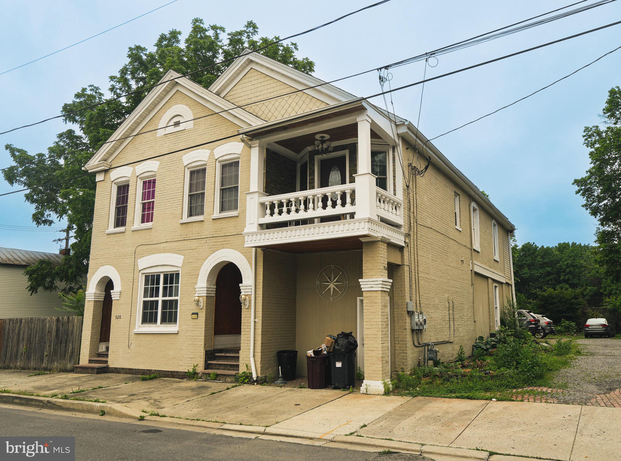 An exceptional investment opportunity in the heart of downtown, this well-maintained duplex offers strong income potential and long-term value.
Unit 328 is currently operating as a successful Airbnb and features 2 bedrooms, 1 full bath, plus a bonus space currently used as an additional bedroom, along with a spacious living room and its garage.
Unit 330 is a fully renovated, turnkey 3-bedroom, 2-bath apartment spacious living room, dining area with two balconies, and a large sunroom. Move-in ready and perfect for long-term rental or owner-occupancy, this unit provides immediate income-producing potential.
Located in a high-demand area with excellent street visibility, this property combines charm, functionality, and versatility. Whether you're a seasoned investor or seeking a house-hacking opportunity, this duplex presents exceptional value and a rare chance to own a proven income-generating asset in a prime location.