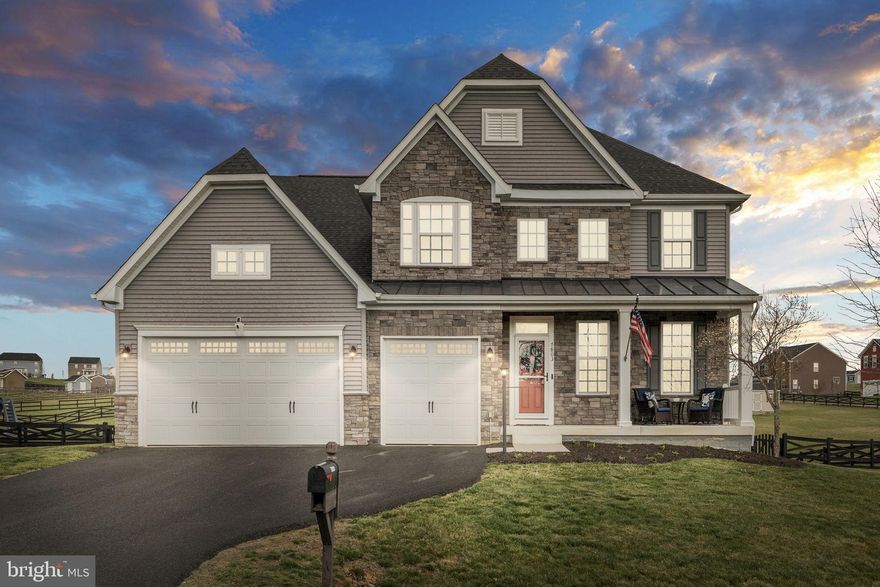 Nestled in the prestigious community of The Crossings at Chancellorsville, this exquisite 5-bedroom, 5-bathroom residence embodies luxury and comfort. Built in 2019, ​with over 4,700 sqft, the home showcases a stunning blend of Colonial and Craftsman architectural styles, featuring a captivating stone and vinyl siding exterior that invites you in. Step inside to discover a thoughtfully designed open floor plan, where natural light dances across hardwood floors. The gourmet kitchen, equipped with stainless steel appliances, an expansive island, and granite countertops, seamlessly flows into the family room, perfect for entertaining. Enjoy cozy evenings by the gas fireplace, adorned with a beautiful stone mantel. Retreat to the primary suite, complete with a lavish walk-in closet and a spa-like bathroom featuring a luxurious oversized corner walk-in shower with bench seating. Each additional bedroom has an attached ensuite and offers ample space and comfort, ensuring everyone has their own sanctuary. The fully finished basement, with a rec room, media room, and gym area, provides endless possibilities for recreation or relaxation. Outside, the meticulously landscaped 0.76-acre lot features extensive hardscaping, including an inviting stamped concrete patio with a pergola for shade, creating an ideal setting for outdoor gatherings. With a 3-car attached garage and lighted paved driveway, convenience meets elegance. ​Conveniently located near popular restaurants, shopping, and hospitals, this home is not just a residence; it's a lifestyle, offering the perfect blend of luxury, comfort, and community. Experience the exceptional living that awaits you in this remarkable property.