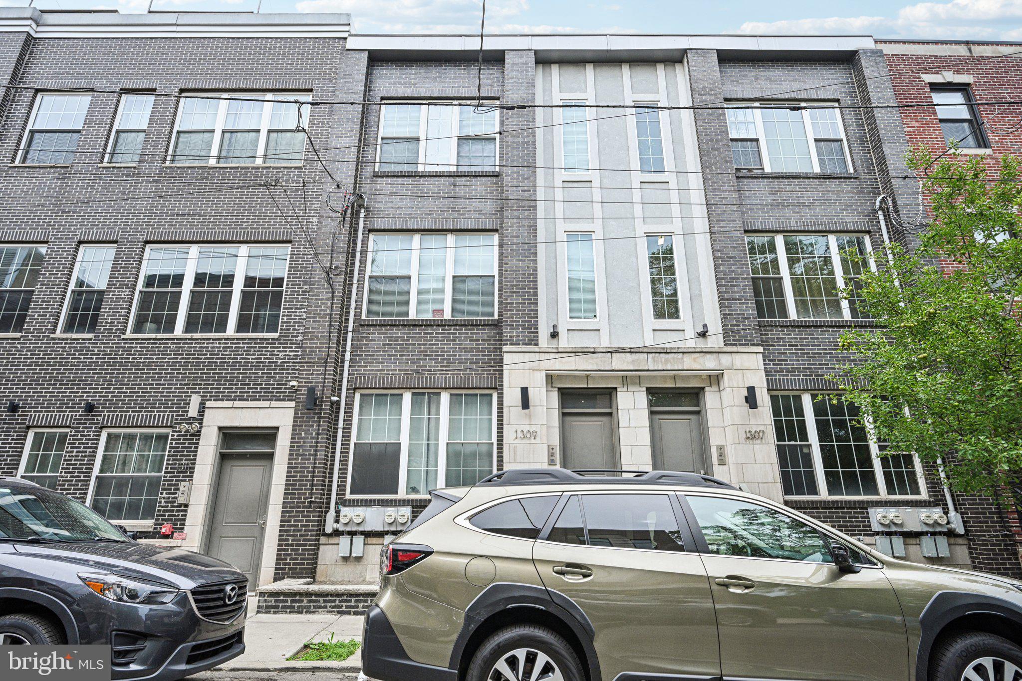 This bright and breezy 1 bed, 1 bath condo is basically in a long-term relationship with the sky—thanks to a ton of skylights! Newer construction in the Ludlow neighborhood of Philly means granite countertops, stainless steel appliances, high ceilings, and modern everything. Located on the 2nd and 3rd floor of a 3 unit building means no upstairs neighbors, and plenty of space to enjoy. Step out onto your private balcony and soak in city vibes with your morning coffee or late-night snack. This property also features tray ceilings, oversized island, plus hardwood flooring throughout. The primary bathroom features a double vanity, and not to mention a massive walk in shower and soaking tub. And you guessed it - another skylight over the shower! The upstairs features ample closet space, and a full size washer and dryer. It’s cozy, contemporary, and has just the right amount of character—kind of like Philly itself.