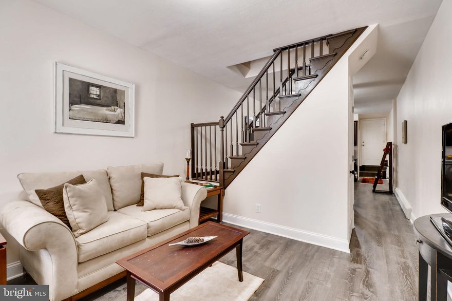 Charming, updated home with just enough space! Blocks from lovely Patterson Park and Johns Hopkins Wolfe Street and Broadway locations. Two bedrooms and 1 full bath is perfect space -- so why would you rent?! The kitchen features 42-inch cabinets, granite countertops and stainless steel appliances. Updated bathroom has neutral decor and ceramic tile. Newly updated with fixtures, ceiling fans, freshly painted, new carpet and faux wood flooring on the first level. Rear yard is fenced and a great patio space and there is even a full basement that has been freshly painted for storage or can be updated with more finished living space. Washer and dryer are older but still work. Easy commute to downtown and to shopping. Waiting for you to call This charming space your home!