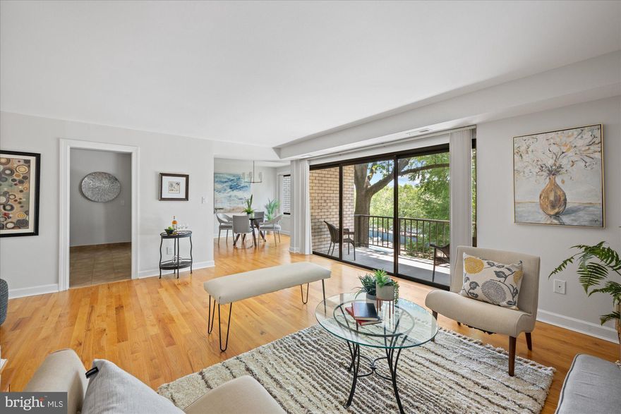 Light-filled two-bed, two-bath condo includes a private balcony overlooking the courtyard and pool. This multi-level unit has a spacious open floor plan. The main level is perfect for entertaining, with an open living room, kitchen, and dining space. The home chef or baker will be at home in the kitchen with its granite countertops and stainless steel appliances. The upper level of the unit includes a luxurious primary suite, a guest/office space, and an in-unit washer and dryer. Extra storage is just down the hall. The building has low condo fees and is pet-friendly. Reserved parking space conveys along with additional guest parking passes. Minutes to the metro, shopping, restaurants, and groceries. Easy commute to Georgia Ave, University Blvd, and the Beltway.