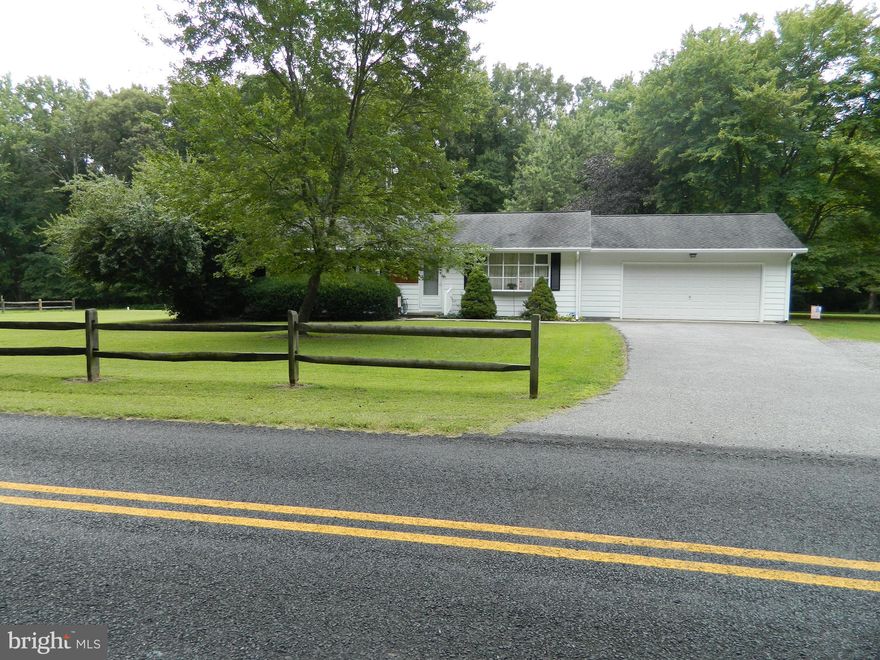 very nice Rancher on 1.8  acres, 3 Bathrooms, 1.5 Baths,  screen in back Porch, new heat pump,