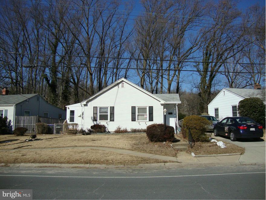 Location, Location easy commute to DC, Bethesda NIH, Navy Medical 495/95.  Home backs to Beach Drive single family home, hardwood floors, additional room could be office, den, etc. Fenced backyard, table space kitchen.  Could be good home for remodel/renovation for your dream home.