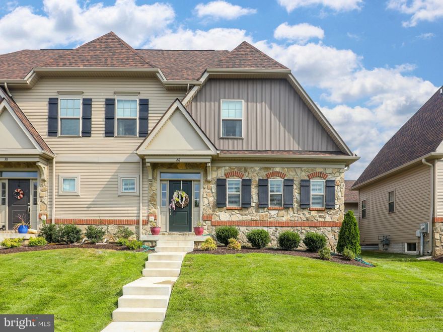 A luxury townhome in Jefferson County is hard to come by, but look no further than 26 Lewis Washington. Located in the esteemed Beallair community, a site that holds historical significance, this property is one of four semi-detached units and includes an open-concept floor plan, main floor owner's suite and laundry area, fully finished basement with spacious bedroom and bath, two additional bedrooms upstairs with another full bath, plus a 2-car attached garage. The finishes are exquisite - from luxury vinyl plank flooring throughout the main level and staircase to upgraded countertops, built-ins, molding details, and more. Outside is a partially fenced concrete patio and fully enclosed grass area -- perfect for letting out your furry friends -- plus a newly sodded front yard. Built less than 3 years ago, this lightly lived in home is almost like new and shows like a model! Close to both Rt. 340 and Flowing Springs Rd for easy access to the MD and VA thoroughfares. Neighborhood amenities include walking trails, leisure areas, and potentially a community pool in the near future. Be close to everything you need while living in a beautiful, low-maintenance setting full of deluxe amenities!