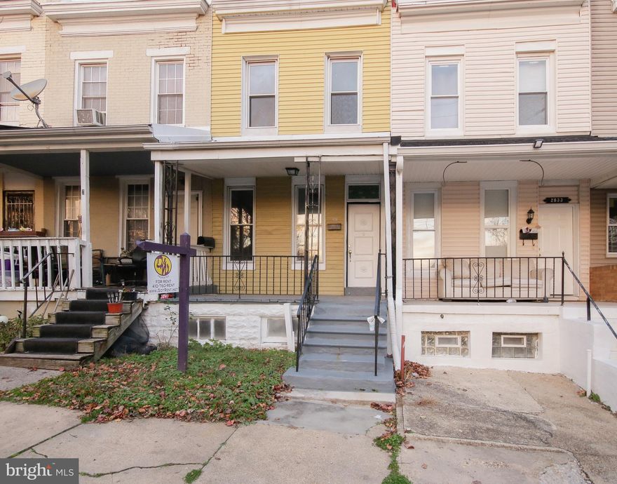 Nice rowhome on quiet street minutes from Downtown! Hardwood floors throughout, large living room and separate dining room, large eat in kitchen, new paint, washer and dryer, painted basement for storage, covered front porch and nice fenced in back yard. Minutes from downtown and walking distance to transportation. Water included in rent.