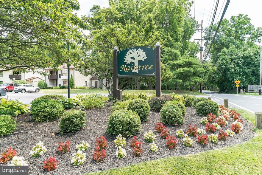 Welcome to 1704 Raintree Lane, a coveted first-floor residence in the sought-after Raintree community of Malvern Borough. This move-in ready home offers true one-floor living with no steps for easy everyday comfort. Enter into the open main living space, where the dining area flows seamlessly into the kitchen featuring granite countertops. The spacious living room is filled with natural light and offers sliding glass doors to the first of two private decks—an ideal spot for morning coffee or unwinding in the evening. From here, you’ll also find access to the utility closet. Back inside, the hallway includes a generously sized laundry closet with overhead shelving, along with an additional deep linen/storage closet. Just across the hall is a flexible bonus space currently used as a home office, but equally suited for extra storage, hobby space, or a small reading nook. The secondary bedroom is well proportioned and is served by the hall bath, complete with a tub/shower combination, single vanity, and medicine cabinet for added storage. At the end of the hall, the spacious primary suite features a walk-in closet, en suite bath with step-in shower, single vanity, and full-size medicine/linen cabinet. Sliding glass doors open to the second private deck, creating a peaceful retreat. Building 17 enjoys a prime location close to the community pool and clubhouse, perfect for summer enjoyment. Raintree offers a low-maintenance lifestyle with HOA dues covering water, sewer, trash, heat, lawn care, and exterior building maintenance. Located in Great Valley School District, the community is walkable to all that Malvern has to offer, including restaurants, shops, festivals, the farmer’s market, and the train station, while remaining just minutes from major routes and everyday conveniences such as Wegmans and Target. We have been informed by the property manager that dues are set to increase to $499 in June. The association restricts investors, dogs, motorcycles, trucks - indoor cats allowed.