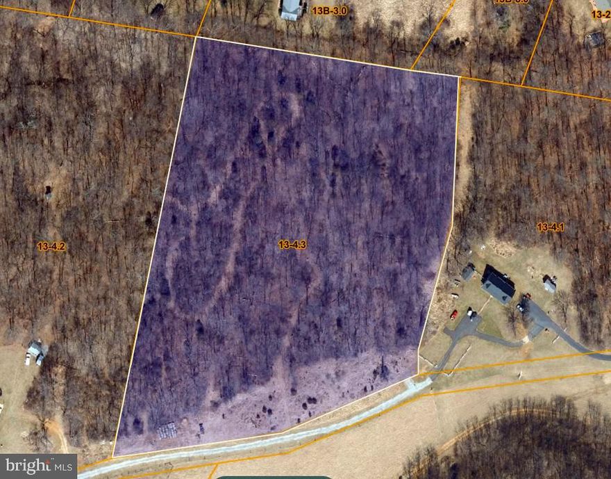 Discover the perfect blend of privacy, convenience, and natural beauty on this unrestricted 9.14-acre wooded property. Tucked off Ropp Drive and accessed by a gravel right-of-way, this peaceful parcel offers a rare opportunity to build your dream home in a serene setting while staying close to I-81, shopping, and schools.

Follow the established trail up the gentle slope to a spacious, naturally level build site bordered by a striking rock ridge. This elevated clearing provides the ideal location for a private homesite surrounded by mature trees and wildlife. The remainder of the lot adds buffer, seclusion, and endless potential for trails, outdoor recreation, or future improvements.

Key improvements already in place include public sewer access at the road and an electric transformer at the front of the lot, significantly reducing development costs. A private well will be needed. With no HOA and no restrictions, the possibilities are wide open. Build a custom home, create a retreat-style property, or develop the land to fit your vision.

Whether you’re a builder, investor, or future homeowner seeking acreage with flexibility, this location offers exceptional value and potential in a rapidly growing area.

Private, wooded, and ready for your plans. Your Eastern Panhandle escape begins here!