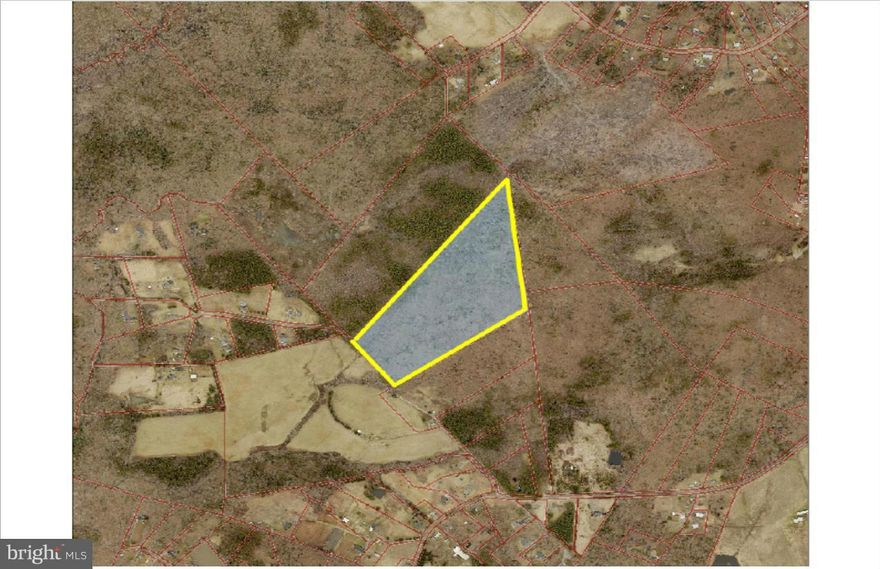 36 wooded acres on Monroe Farm Road just off of Rt. 17. Split zoned 26 ac A1 and 10 ac M1. Beautiful wooded parcel in a picturesque setting. Convenient to schools and shopping. Backs to land owned by University of Mary Washington.