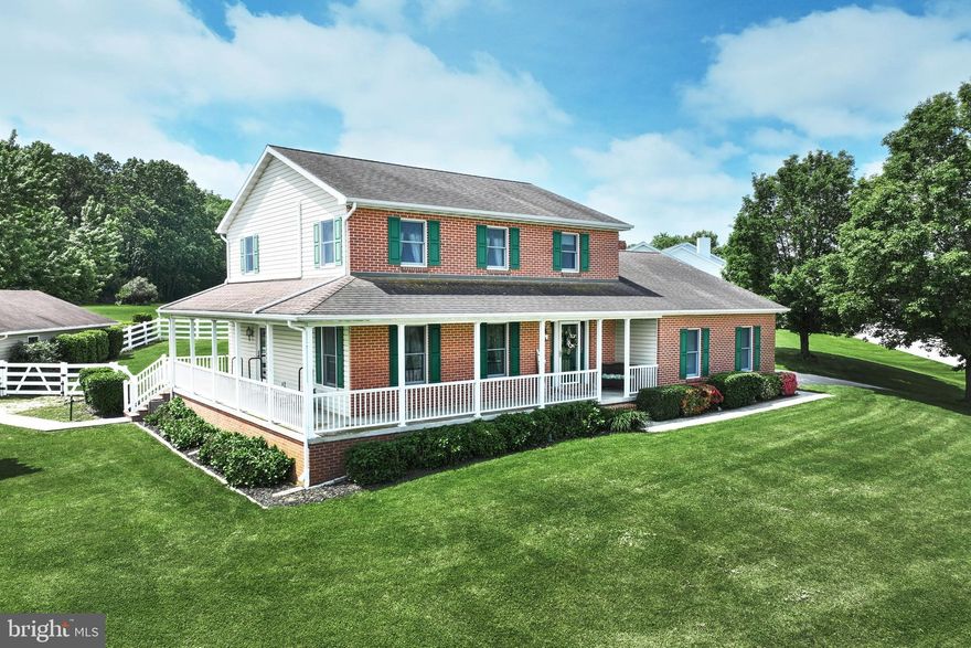 Coming Soon!  Showings start Wednesday May 22nd.  Professional photos are on their way.  Welcome home to this charming brick front Colonial located on a picturesque acre lot with stunning views at 61 Fox Tail Drive. As you approach, you will be greeted by a wrap-around porch perfect for enjoying your morning coffee while watching the sunrise. This lovely home features 3 bedrooms and 2.5 bathrooms, including a spacious primary suite with a jetted tub and separate shower. The kitchen boasts granite countertops, a breakfast bar, and plenty of natural light. The cozy family room includes a bay window and a fireplace with woodstove insert and a stainless steel liner, perfect for those cold winter nights. Outside, you will find a Trex covered deck overlooking a partially vinyl fenced yard, ideal for entertaining or relaxing outdoors.  The property includes  not one, but two garages - a 2 car attached garage and a 3 car detached garage with a separate driveway which provides plenty of space for storage or a workshop area. Additional features of this home include a first-floor laundry, newer propane HVAC and hot water heater, and two finished large rooms in the lower level.  Two mini splits in the bedroom area add extra comfort. Reasonable taxes and utilities, this home is a must see.   Don't miss out on the opportunity to make this beautiful house your new home!