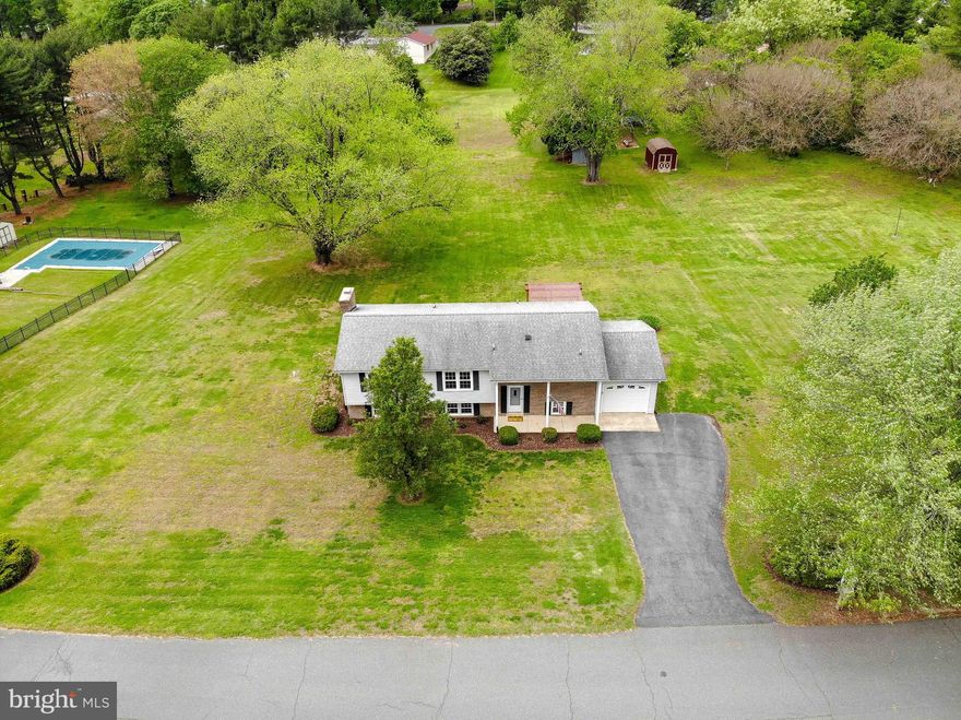 Fantastic location of Northern Dunkirk!  Flat backyard with lots of room for a pool or garden! Owner's bathroom and hall bathroom have been completely remodeled with new cabinets, light fixtures and ceramic tile.  Remainder of the home is dated, but new owner can easily update over time as house has been well maintained! A new high-efficiency heat pump was installed in 2022, a new septic drain field was installed in 2017, and roof has been replaced with 30 year shingles approximately 10 years ago.   Could easily make an in-law apartment in finished walk-out lower basement --lots of light and a full second kitchen that also serves  as an excellent bar area for entertaining! Has a wood stove in basement that will heat the whole house during cold winters.  Table in kitchen was custom built and conveys. Easy commute to Joint Base Andrews, Annapolis, Washington DC and near Dunkirk shopping and restaurants!