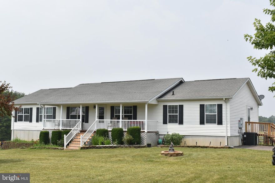 Welcome to 7810 Next to Never Lane, a Rambler with a full basement with over 4,000 square feet of living space. This home is located on a 20-acre very private and fully fenced parcel with endless options. As you approach the home you will be greeted by a magnificent and unique gate.
Exquisite and charming, this remarkable 4 bedroom, 3.5-bathroom home is nestled in the serene countryside of Spotsylvania, Virginia. This home is located within a few miles of Lake Anna. Boasting a picturesque setting, this property offers a retreat style home for those seeking tranquility and comfort. As you approach the main entrance, you’ll be welcomed by a large front porch. Once you step inside, you’ll be welcome by a large Living Room, turn the corner and you’ll captivated by the ample Dining Room, Kitchen and Family Room. This spacious and inviting space is perfect for hosting gatherings and creating unforgettable memories with friends and loved ones. The main level also offers a large Primary bedroom with a large walk-in closet and a private primary bathroom with a nice jacuzzi tub. Main level also offers two secondary bedrooms, one full bath and one-half bathroom.
The large and inviting basement offers a 4th bedroom (NTC), another full bathroom, an office/den and a very large recreation room. Walk out through the lower-level French doors into a wood deck area and enjoy the breath-taking views of this property. From the main level you can step outside onto the expansive deck, where you'll be greeted by breathtaking views of the sprawling backyard. The large deck provides a private oasis for outdoor activities, from enjoying morning coffee amidst nature's beauty to hosting delightful gatherings under the stars.
New HVAC unit. Both decks were recently refaced. House also offers a two-car detached aluminum garage and a two-car carport. Paved driveway with ample space for multiple cars.

Let’s not forget about the special gazebo area by your own private pond, this area can be really categorized as your own private camping area. 

This home will not last long. Contact the listing agent for a private tour of this home. 
You will not be disappointed!