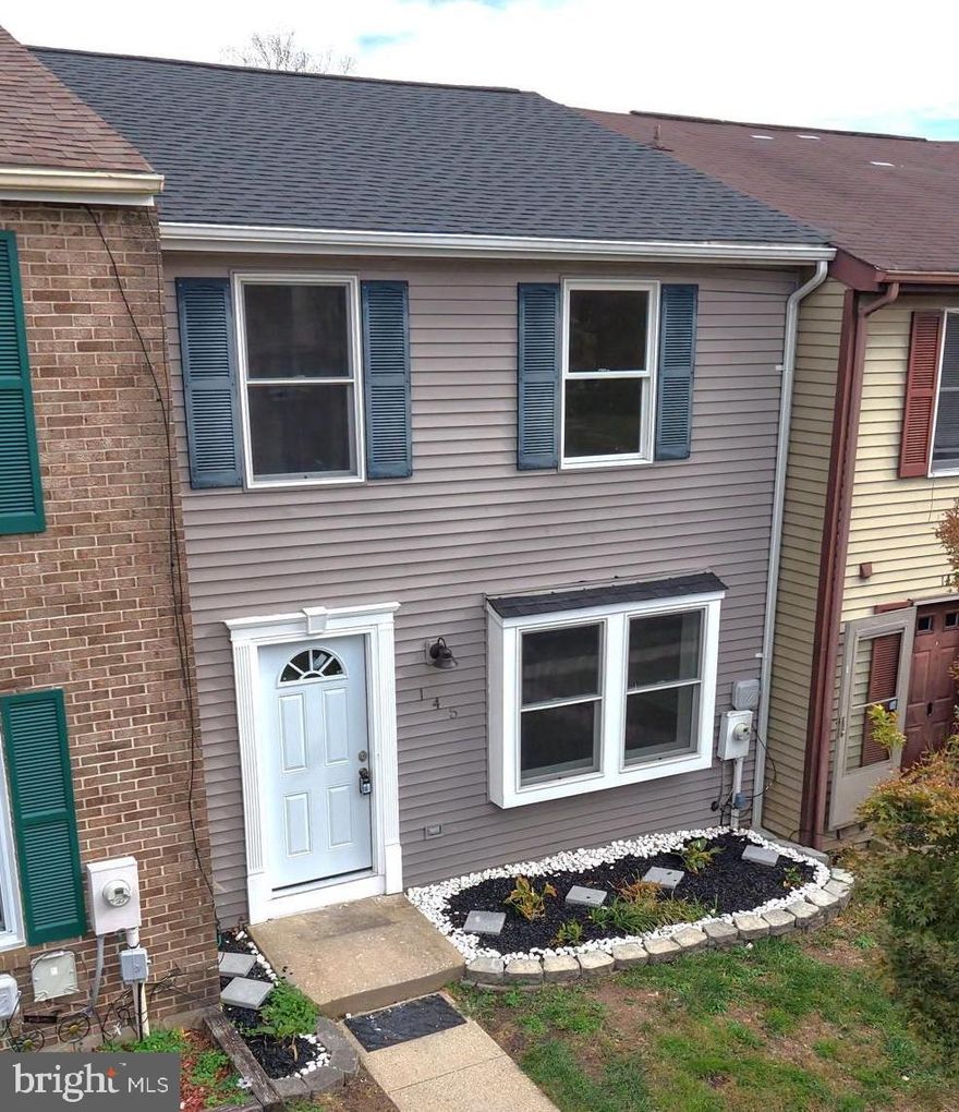 **Freshly priced and ready to impress** This move-in-ready home has been **extensively upgraded**, featuring a **new roof, new A/C unit, brand-new washer and dryer, and all new stainless steel kitchen appliances**—providing peace of mind for years to come. The entire home has been **freshly repainted**, complemented by **new carpet**, **newly stained hardwood floors**, and **tile flooring in the foyer and all bathrooms**.

Inside, the thoughtfully designed layout includes **3 bedrooms, 2 full baths, and 2 half baths**. The spacious primary suite is a true retreat, complete with a walk-in closet and a beautifully renovated en-suite bath with upscale finishes. All four bathrooms have been updated, creating a cohesive and elevated feel throughout the home.

The **renovated kitchen** is ideal for both daily living and entertaining, offering gleaming granite countertops, extensive cabinetry, and new stainless steel appliances. Hardwood floors flow across the main level and lead to an **expansive deck**, perfect for relaxing or entertaining while enjoying seasonal foliage and added privacy.

The **finished lower level** provides exceptional flexibility—ideal for a recreation room, home office, den, or additional living space—and includes a convenient half bath.

Queen Anne Village places you minutes from shopping, dining, and entertainment, with easy access to the Baltimore Beltway for effortless commuting and city outings. With its **new systems, modern finishes, versatile spaces, and prime location**, this beautifully refreshed home is truly a must-see.

Schedule your private tour today and experience the value and lifestyle this exceptional property has to offer.  Drone footage of the community:  https://youtu.be/T41AKCRaZY4