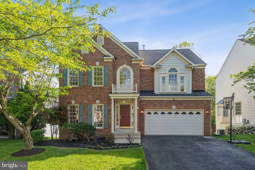 OPEN SUNDAY 4/28, 1-3PM!   Fantastic living in the prestigious Potomac Glen community with  light-filled spaces all day long and natural views of the outdoor greenery. Sited on a PREMIUM LOT backing to WOODS on a QUIETE street, this 1995-built, 5 BR, 3.5 BA,  brick-front home boasts many updates including ROOF (2017), HVAC (around 2018), new hardwood floors, PVC capped exterior wood trims, and washer/dryer, fridge & garage door (2016-2020). Gorgeous features include a 2-story foyer with decorative columns off of the formal living room, a wonderful nook that can be an office nook or open pantry, dining room flanked  by walls of windows and bay windows, a step-down family room with Cathedral ceilings and Fireplace past the kitchen and walls of windows, sliding doors and transom, crown molding and chair railing, and recessed lights. The gourmet island kitchen displays all newer stainless steel appliances, granite countertops and updated maple wood cabinetry. Upper level features an expansive Owner's Suite with Cathedral ceilings and two walk-in closets, and a spacious en-suite bath a soaking tub and a separate shower, as well as 3 more good-sized bedrooms and a hall bath.  The fantastic walkout lower level has 2 recreation rooms, 1 step-down bonus room ideal for home office, a 5th bedroom, and a full bath!!  Step out to the patio  and enjoy the fantastic private yard  for  those morning coffees, evening al fresco dining, summer BBQ or relaxation! Wonderful community amenities include a swimming pool, Clubhouse, tennis courts, basketball court, walking paths, tot lots and sidewalks, all within close proximity to shopping/dining, major transportation, schools, Montgomery County’s biomed hub and more!