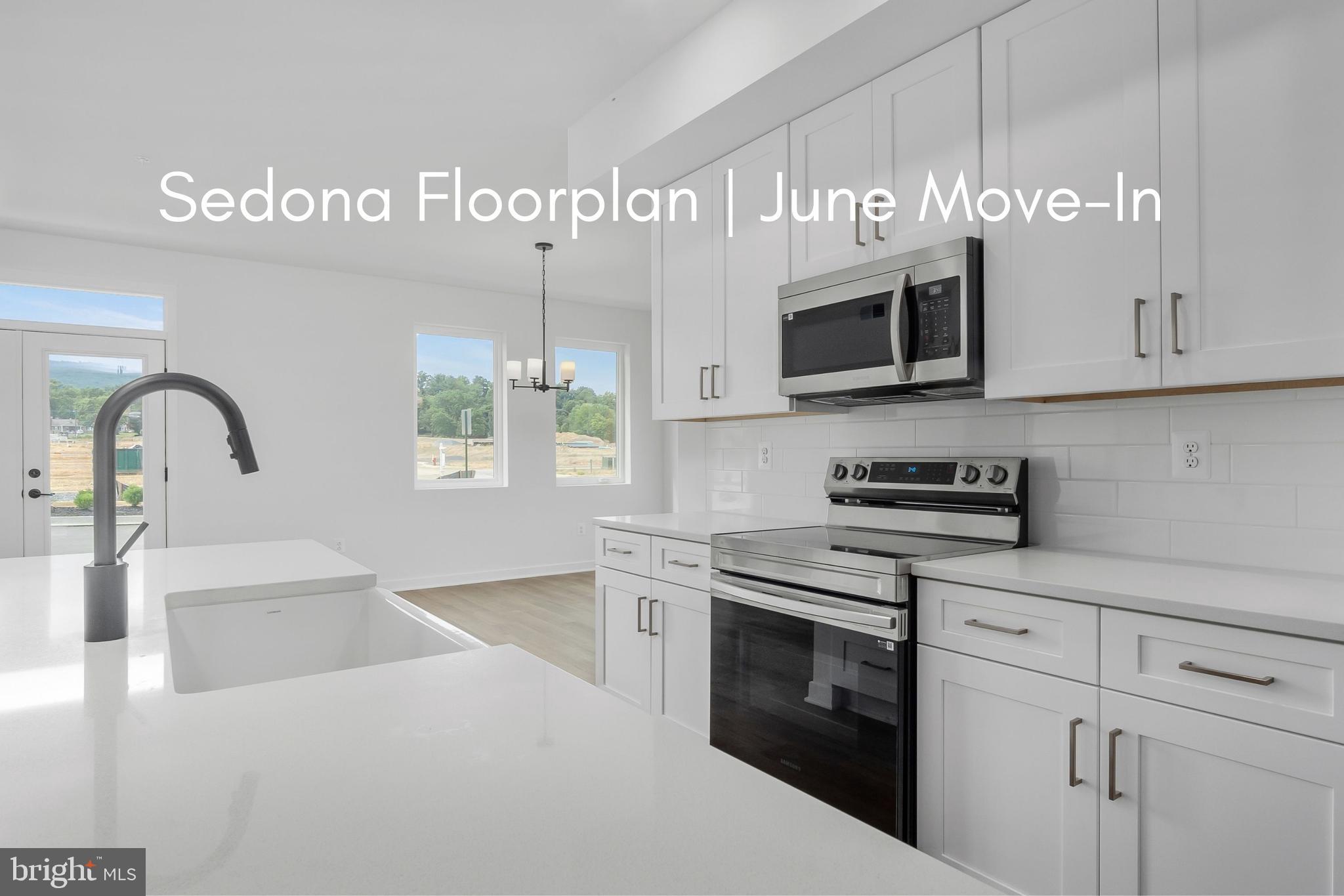 Brand-New Luxury Condo – Summer 2025 Delivery! **Offering $15,000 builder incentive with the use of preferred lender and title!** Welcome to the Sedona floorplan, a thoughtfully crafted home that seamlessly blends modern convenience with the ease of single-floor living. Scheduled for a summer move-in, this brand-new condo features the Shenandoah design package, inspired by the charm of Virginia’s Shenandoah region. With colors that evoke timeless sophistication, tradition, and elegance, this package creates a serene and classic ambiance. Situated on the ground level, this desirable end-unit offers convenient access to the attached garage and patio. The open-concept layout showcases abundant natural light, and seamless flow between the living, dining, and kitchen spaces. The main level includes the owner’s suite, while the upper level provides a private second bedroom with its own full bath—perfect for guests or additional living space. Ideally located near I-70, I-270, and Rt. 15, this community places shopping, dining, outdoor recreation, and downtown Frederick just minutes away. For a limited time, enjoy $15,000 in builder incentives when using our preferred lender and title company. Don’t miss the chance to own this beautifully designed home—schedule your tour today!