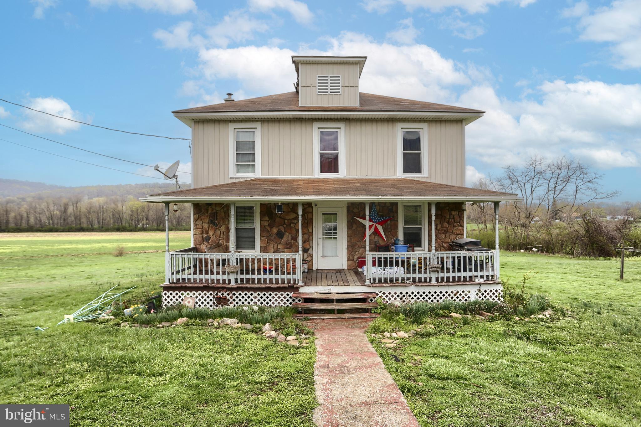 Country Charmer. Traditional style farmhouse on 1.44 acres. Main floor laundry and bath combo. Updated Kitchen and hardwood floors throughout.